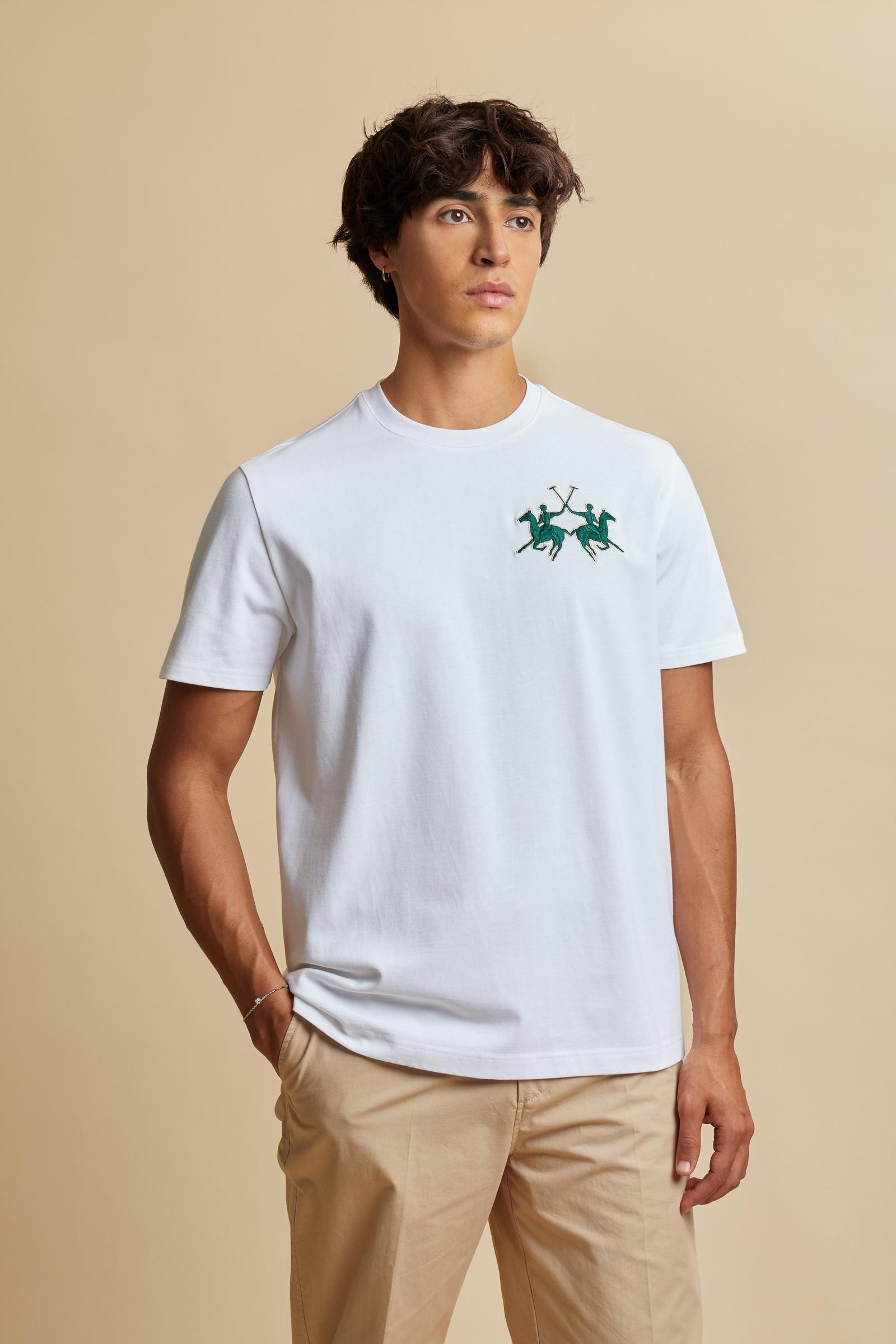 T-shirt in heavy cotton jersey with a structured, boxy fit. Dropped shoulders and clean lines. Large contrasting 3D embroidered logo on the chest. - Optic White