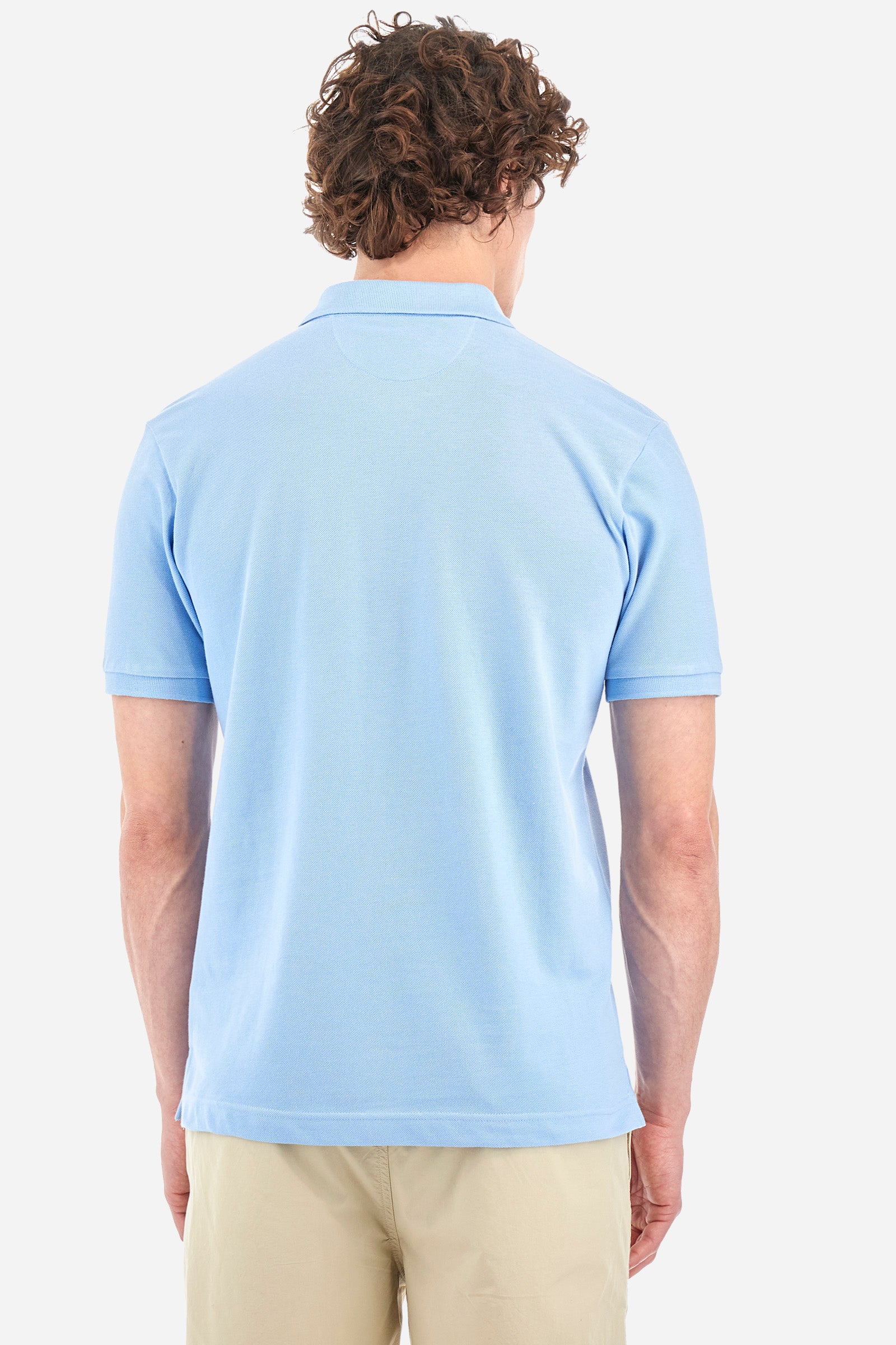 Men's plain-coloured, short-sleeved, regular-fit cotton polo shirt. Contrasting La Martina logo sewn onto the chest. This versatile garment goes perfectly with a pair of jeans from the collection. - Blue Bell