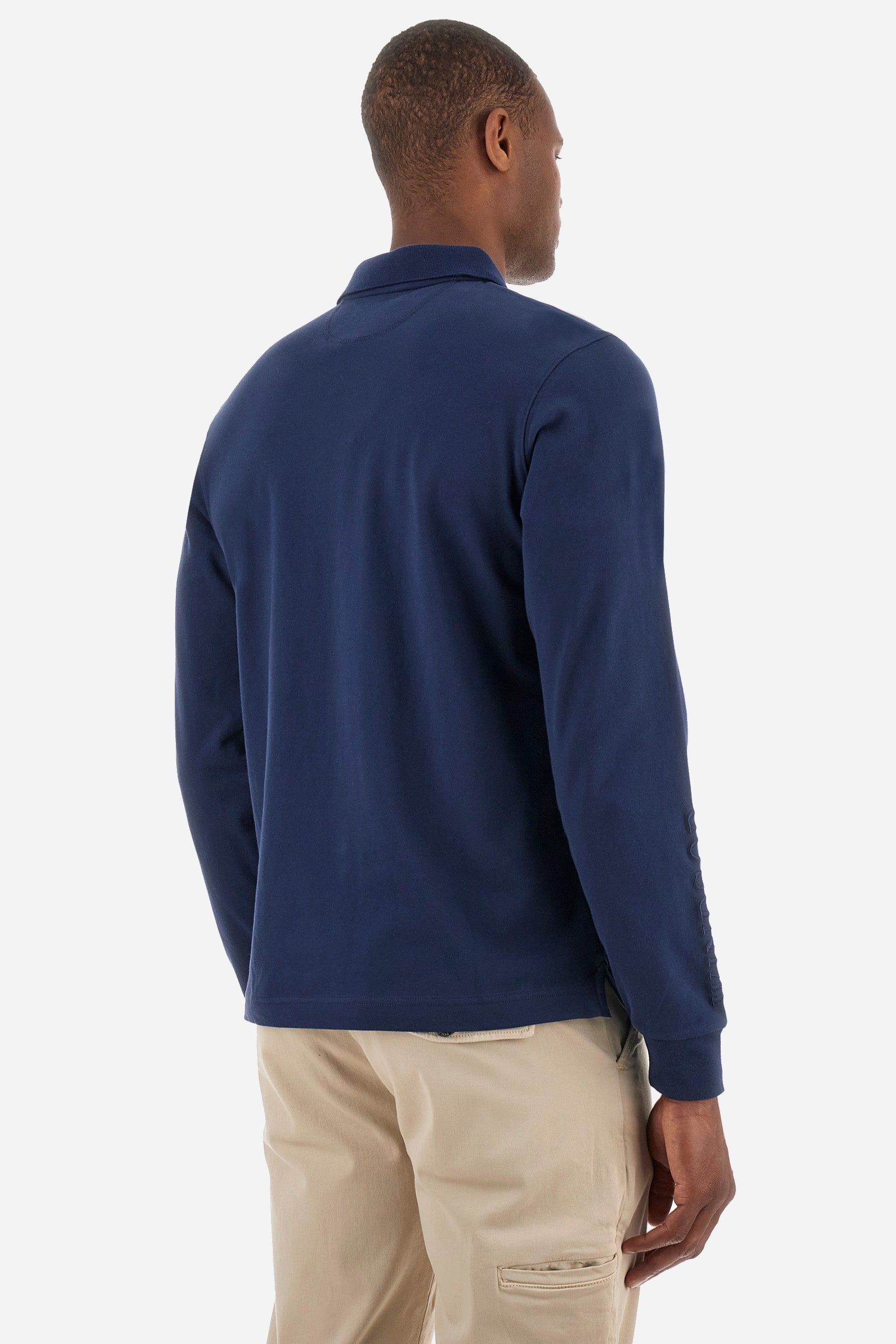 Men's long-sleeved Guards polo shirt in plain stretch cotton. Two-button fastening. Embellished with tone-on-tone embroidery on the sleeves. The logo and symbol of the line appear on the front. Regular fit. The model is wearing a size L. - Navy