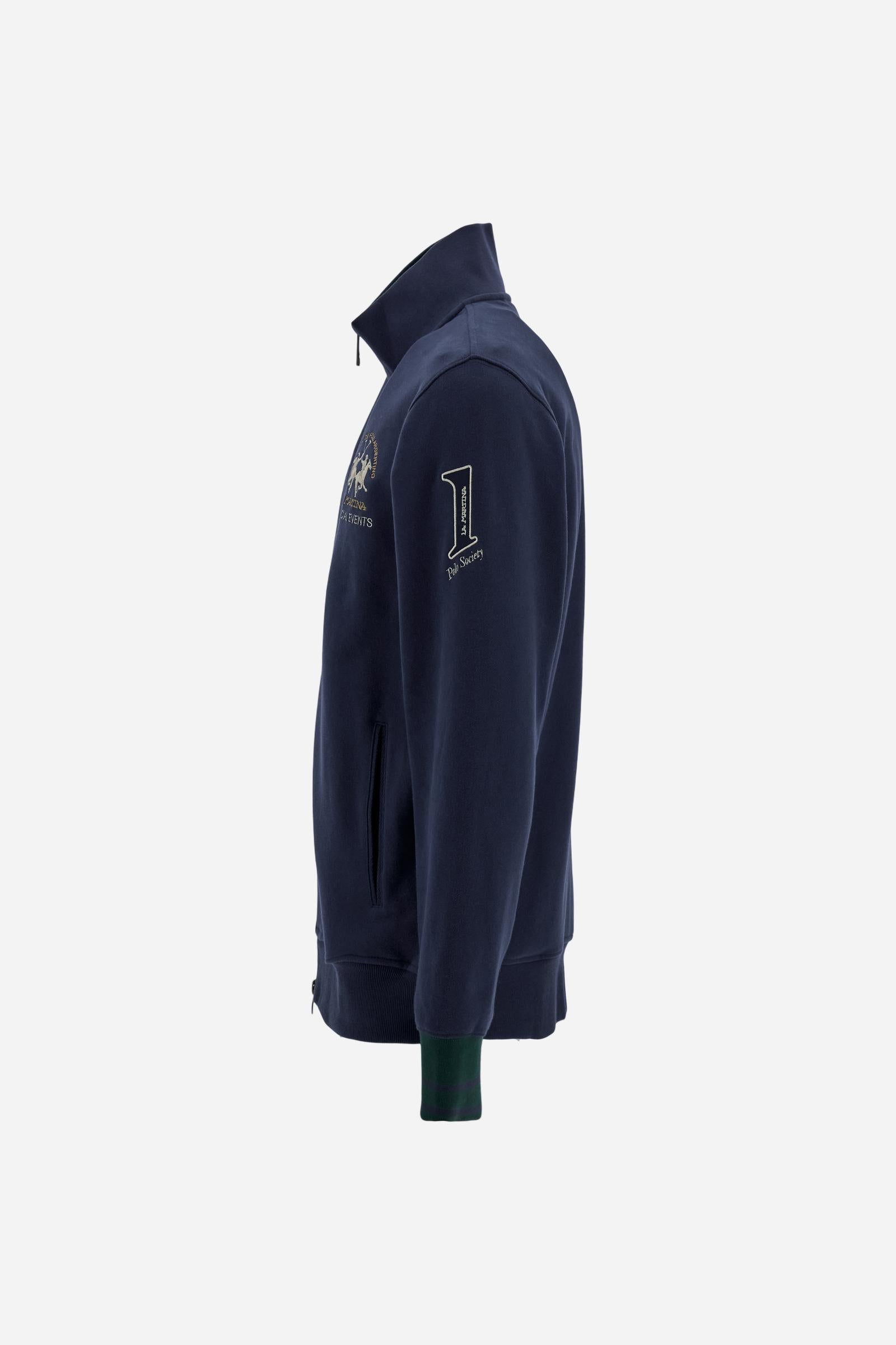 Men's long-sleeved sweatshirt in solid cotton with customised front zip. Contrast rib cuffs and inner collar with multicolour stripe add character. Chest and sleeve decorated with graphics dedicated to the English polo team, large embroidered team logo on the chest. Regular fit providing comfort and functionality. Model wears size L. - Navy