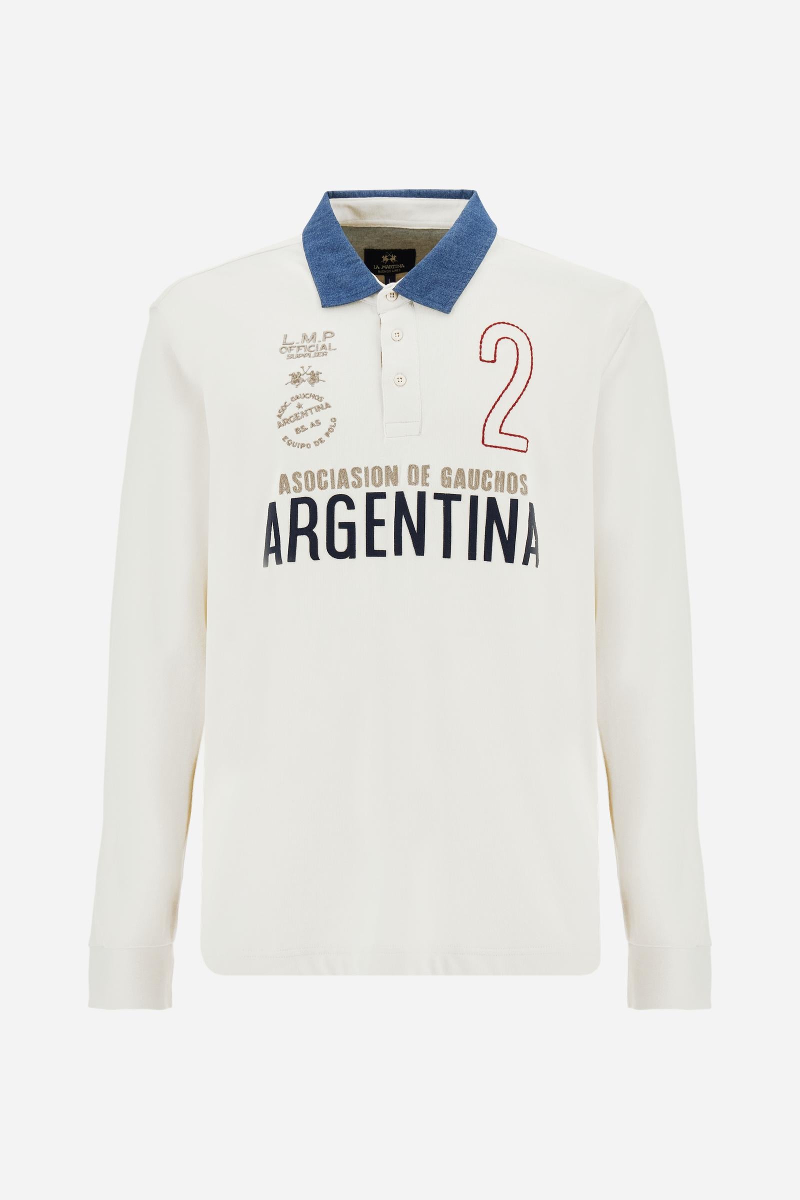 Men’s long-sleeve polo shirt in solid-colour cotton jersey with a warm touch. Contrast details on collar and three-button placket with mixed fabrics and colours. Patches and embroidery celebrate the Asociación Gauchos Argentinos. Small embroidered logo on the chest integrated with other graphics. Regular fit. The model wears size L. - Pristine
