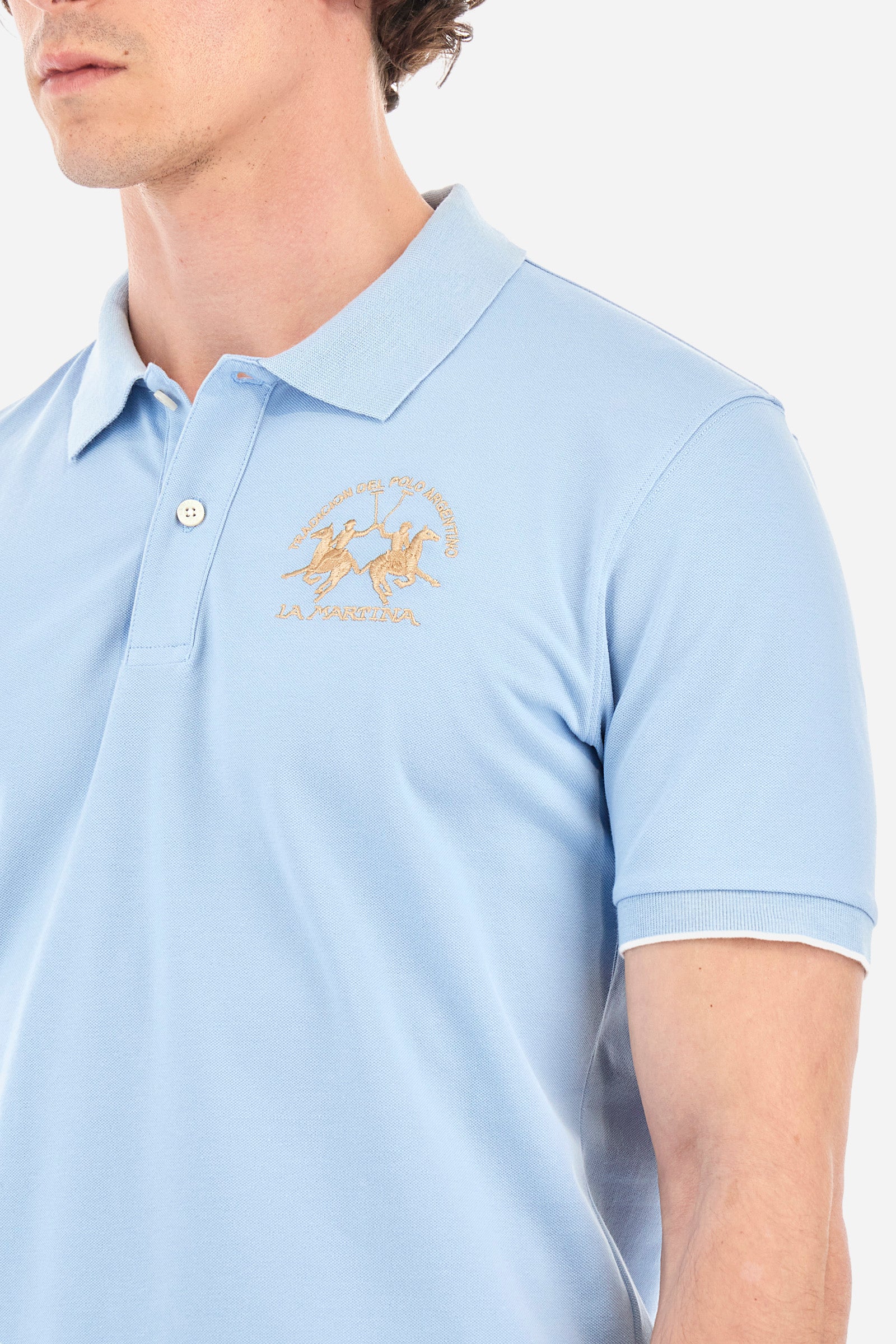 Men's short-sleeved, regular-fit polo shirt. A classic model with a contrasting La Martina logo-embellished chest and profiled sleeve trims. Perfect when worn with a pair of jeans from the collection. - Blue Bell