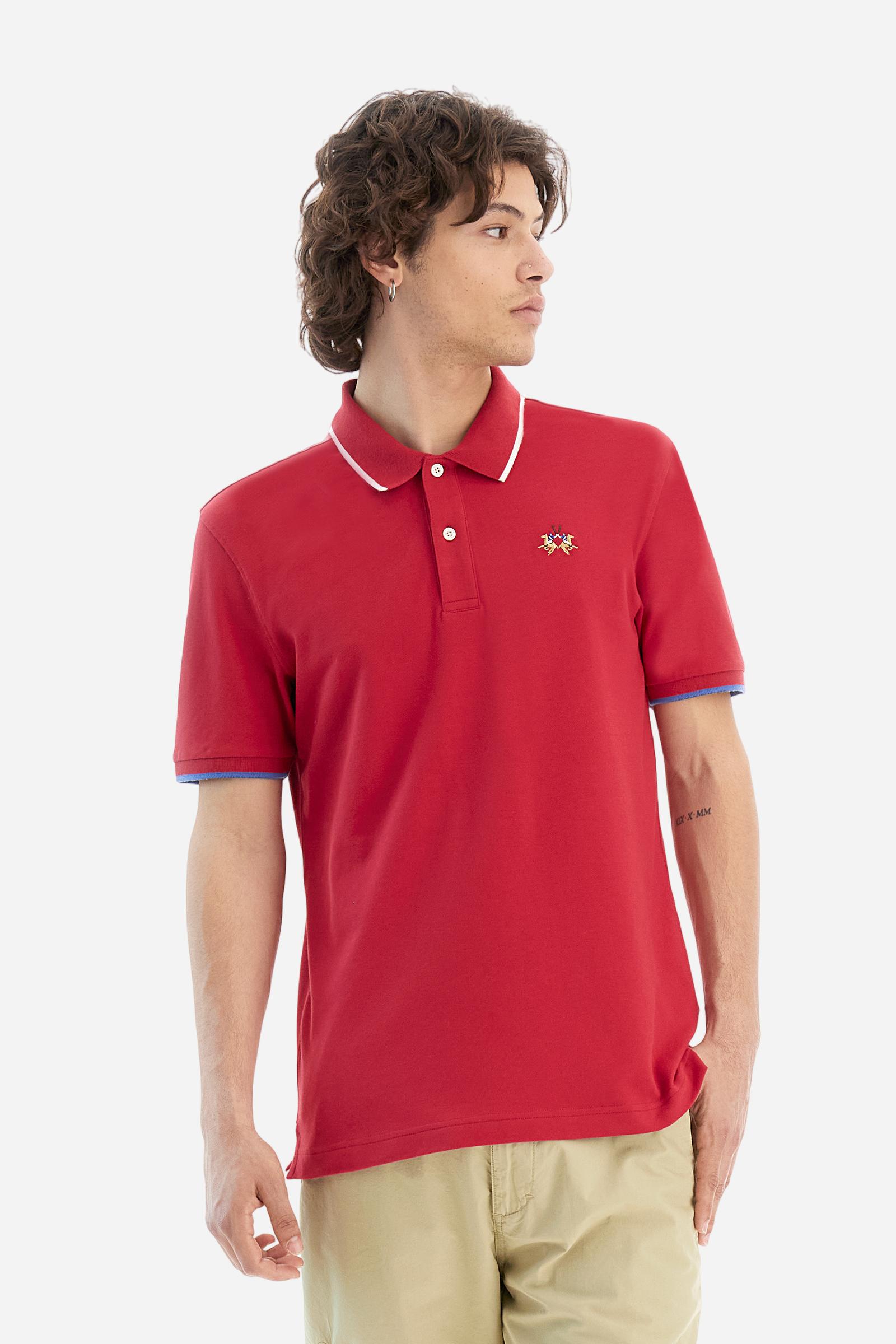 Short-sleeved, single-colour men's polo shirt made of stretch cotton piqué. Fastens with two buttons. The collar and cuffs are ribbed, and there is a colour-contrasting trim at the bottom of the collar. Inside the collar there is a grosgrain ribbon of a different shade. The logo is embroidered on the chest in a contrasting colour. The fit is slim. The model is wearing a size L. - Formula One
