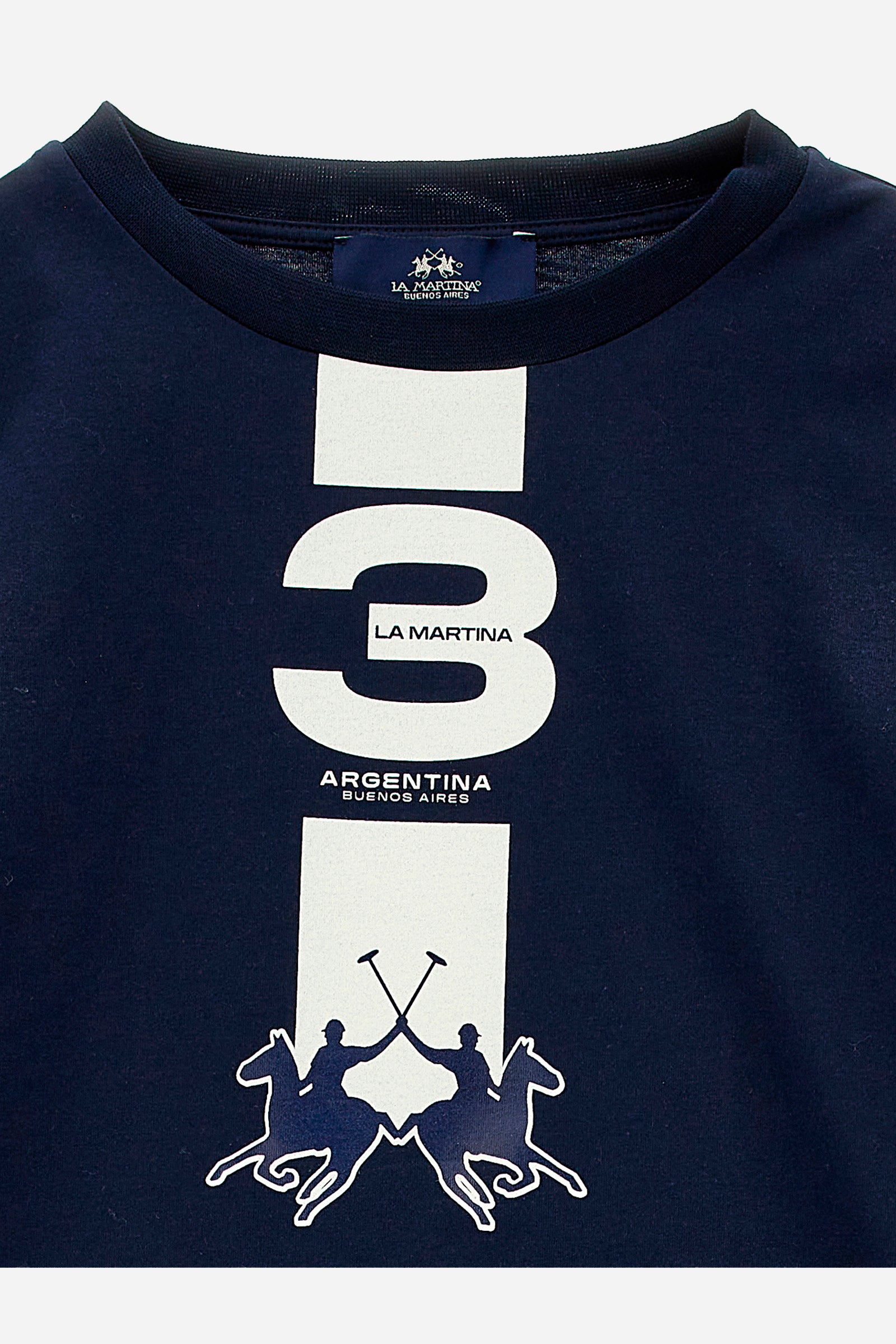 Boys' set consisting of a T-shirt and bermuda shorts, in a single colour. Made of high-quality certified organic cotton. Crew-neck T-shirt. Bermuda shorts with elasticated waist and two slanted pockets on the front. Contrasting details on both pieces. The rubber-printed logo is on the front. - Navy
