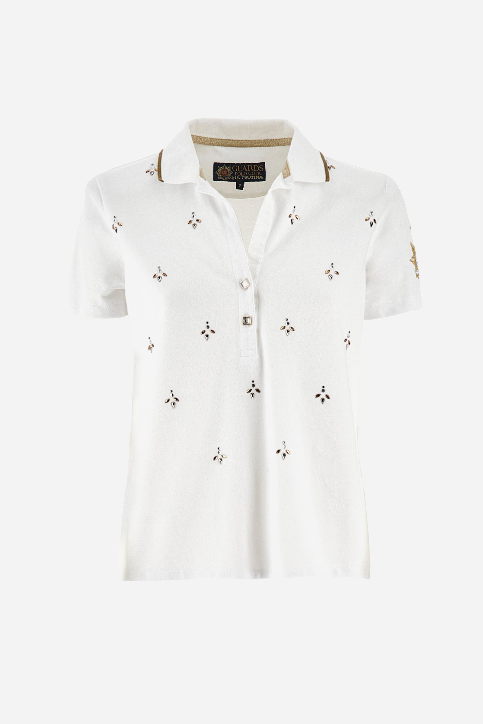 Women’s polo with short sleeves in solid color from the Guards line. Made of stretch cotton. V-neck and 2-button jewel closure. Ribbed collar. Side slits. Rhinestones of various shapes, sizes and colors were applied to the front. The logo and the characteristic symbol of the line are embroidered on a sleeve. The fit is regular. The model wears a size 2 . - Optic White