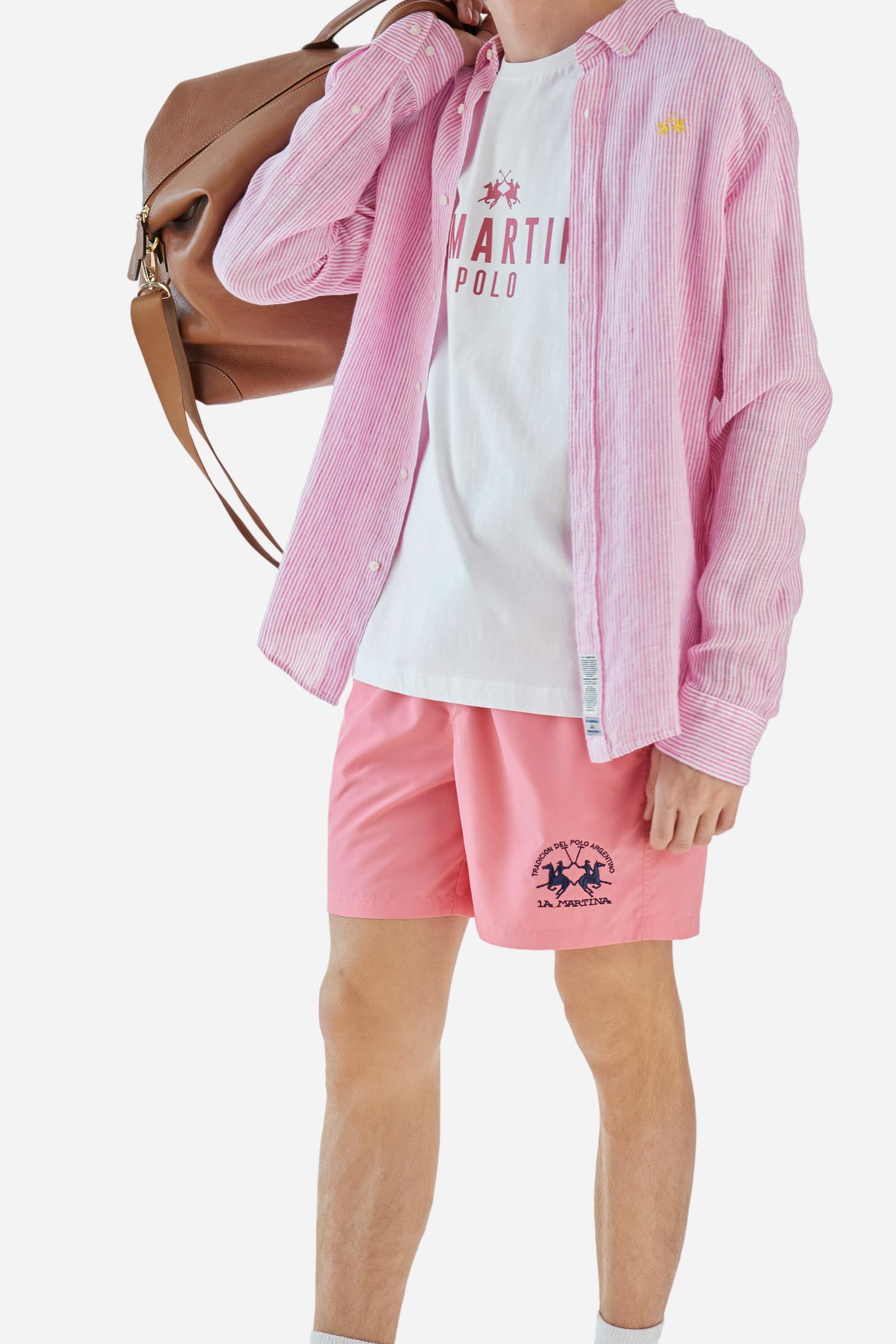 Men's single-colour crew-neck T-shirt with short sleeves, made of 100% cotton. The front features a printed logo and the lettering La Martina Polo. The number 3 is printed on one of the sleeves. Regular fit. The model is wearing a size L. - Opt.White/Honeysuckl