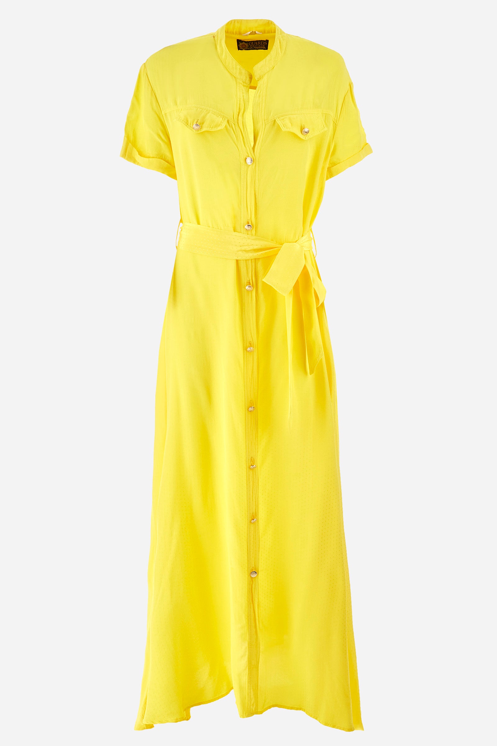Women’s dress with short sleeves in solid color with bright tone on tone details. Made of synthetic viscose satin fabric. Silhouette straight cut and soft, long to the feet. Waist marked by the belt supplied with the head. V-neck and stand-up collar. Closure with buttons that reach up to the end of the dress. Presence of two fake pockets with buttons on the chest. The patch applied on the back with the representative symbol of the Guards line. The fit is regular. The model wears an IT40 size. - Aspen Gold