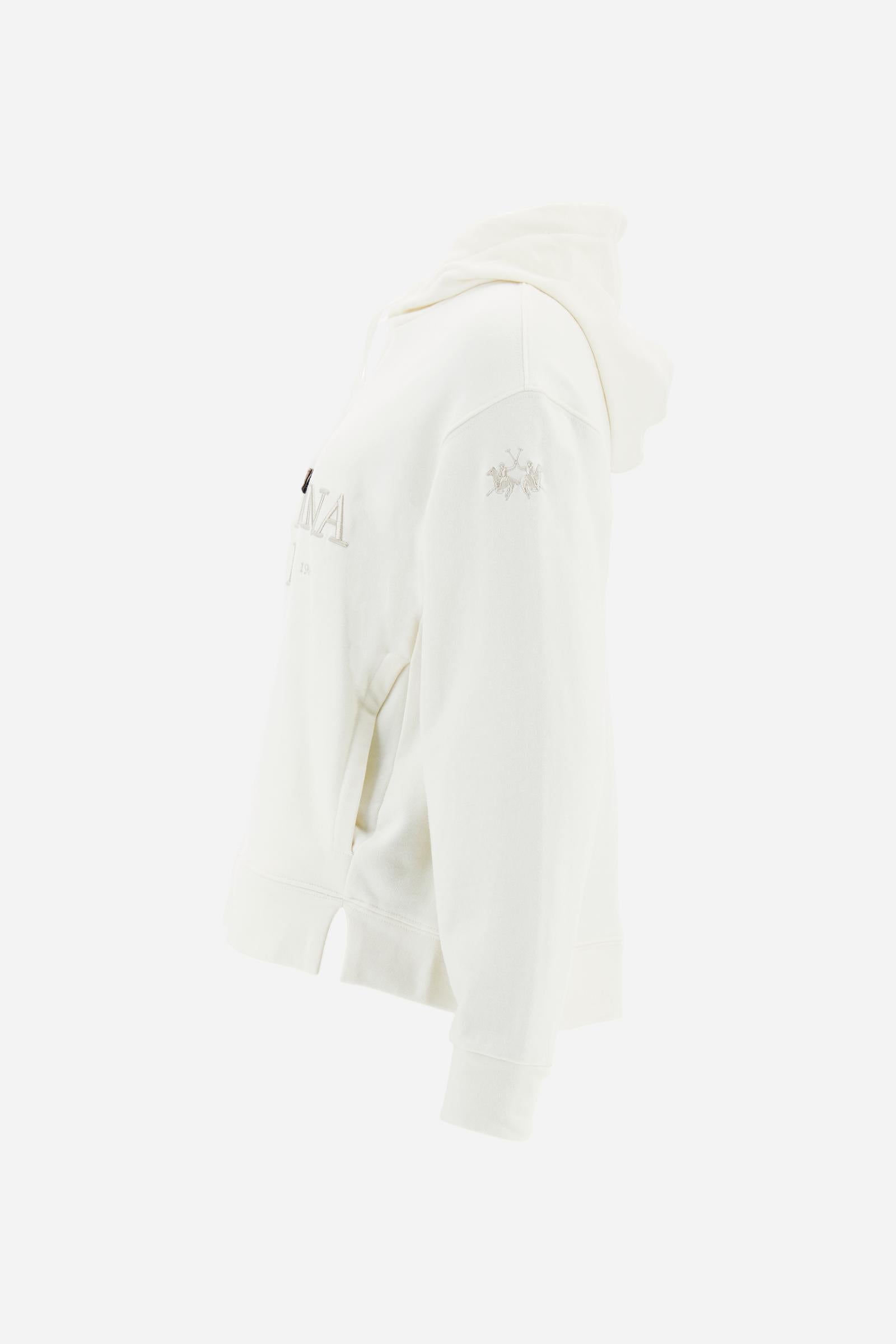 Women’s hoodie with long sleeves in 100% cotton french terry, solid colour with a velvety and warm touch. The hood is lined in tone-on-tone jersey and finished with a velvet drawstring. The chest graphic recalls the refined aesthetics of the Royal Polo theme, while the small brand logo is tone-on-tone embroidered on the sleeve. The model wears size L. - Off White