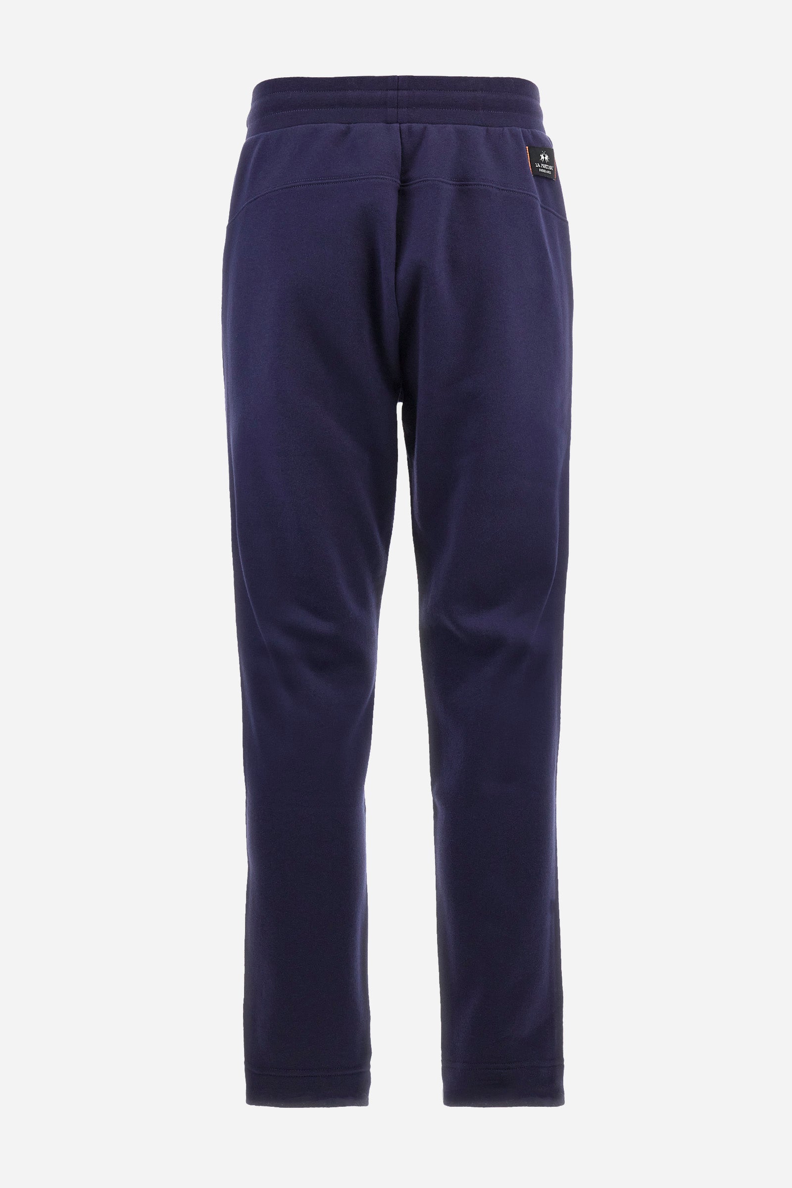 Men's plain jogging bottoms, made from a cotton blend. Drawstring waist and cuffs. Double front pocket. There is an additional zipped pocket on the front. The logo appears on an appliquéd plaque the back. Regular fit. The model is wearing a size L. - Navy