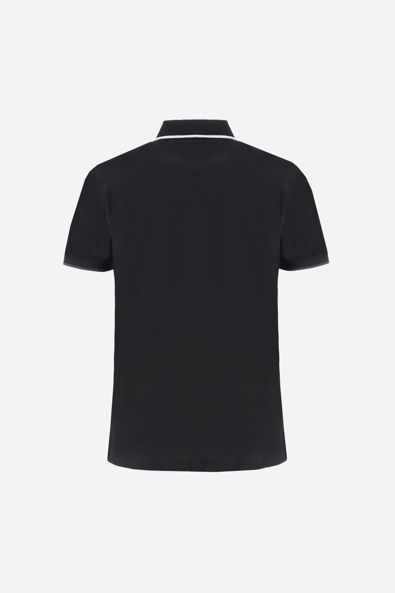 Short-sleeved, single-colour men's polo shirt made of stretch cotton piqué. Fastens with two buttons. The collar and cuffs are ribbed, and there is a colour-contrasting trim at the bottom of the collar. Inside the collar there is a grosgrain ribbon of a different shade. The logo is embroidered on the chest in a contrasting colour. The fit is slim. The model is wearing a size L. - Black