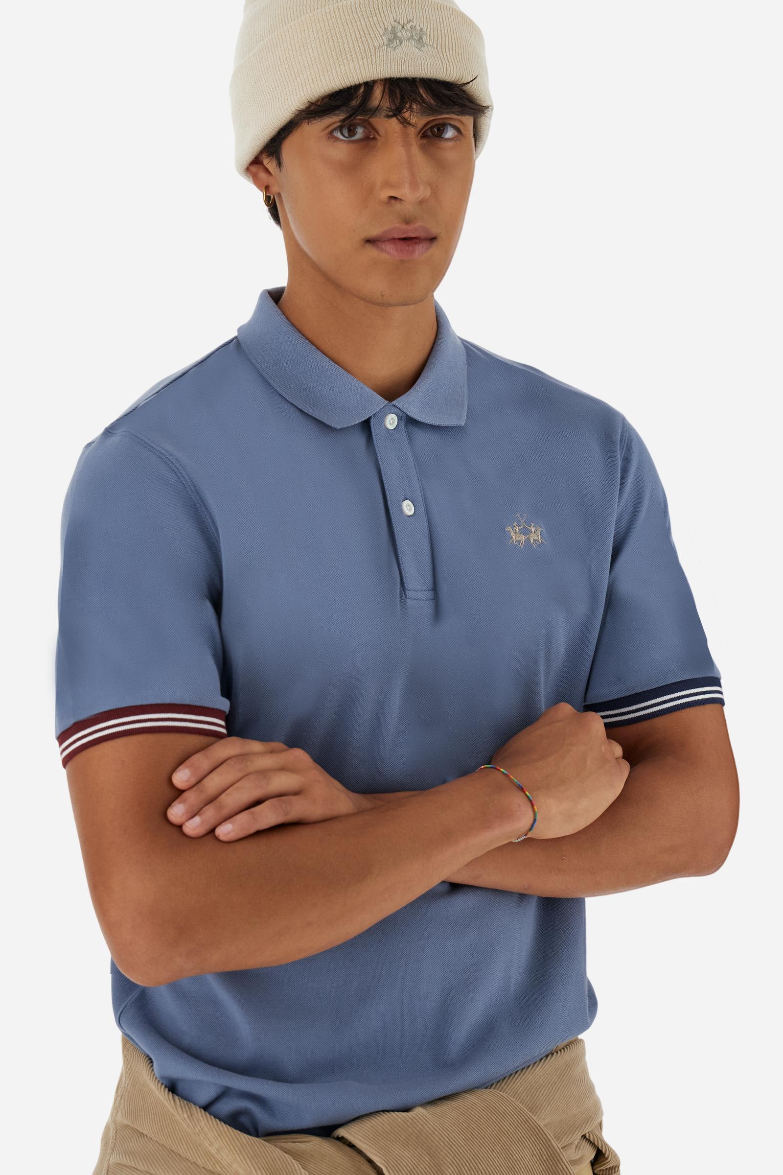 Men’s short-sleeve polo in high-quality stretch cotton piqué, ensuring excellent breathability and flexibility. Classic ribbed collar, two-button placket with customized buttons. Inner collar enriched with contrast tapes and colors for a modern touch. Multicolored ribbed cuffs with different patterns. Small contrast logo embroidered on the chest. Regular fit. Model wears size L. - Flint Stone