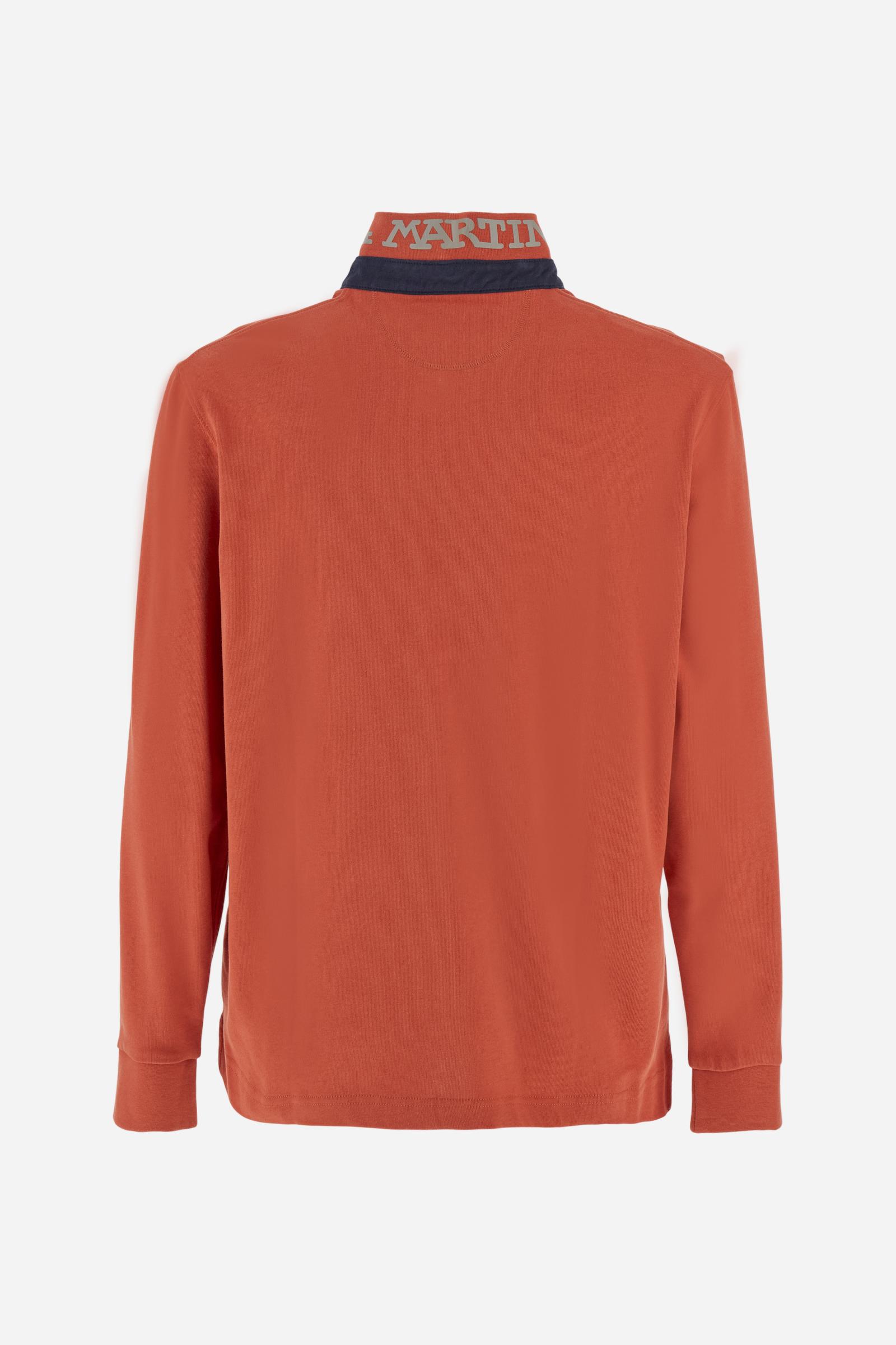 Men’s long-sleeve polo in premium soft-touch cotton jersey for a luxurious feel on the skin. Contrast gabardine details on the collar. Upper collar in tone-on-tone ribbing with printed La Martina lettering undercollar. Three customized buttons, enhanced by a multicolor striped tape on the placket. Contrast embroidered team logo on the chest. Regular fit. Model wears size L. - Burnt Ochre