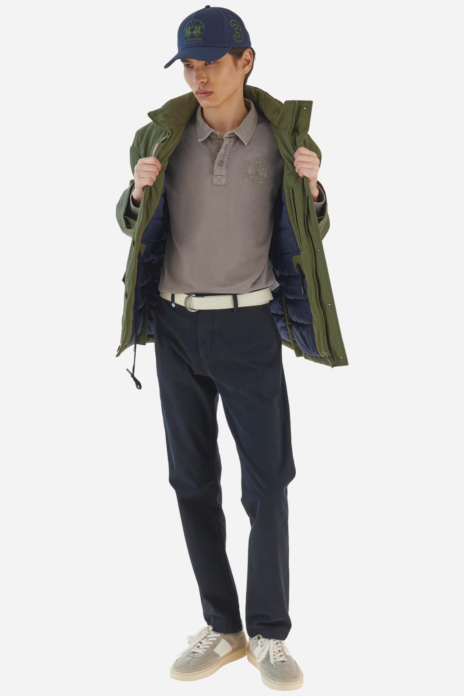 Men’s long-sleeved polo shirt made of 100% cotton piqué garment-dyed with pigments for a slightly faded, lived-in look. Collar and placket in gabardine, ribbed cuffs in tone. Patch on the sleeve and team logo embroidered on the chest, iconic details of the brand. Regular fit. The model wears size L. - Moon Rock