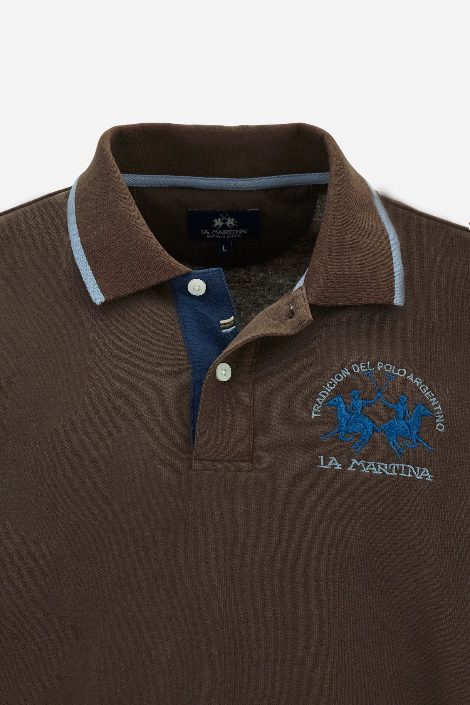 Men’s long-sleeve polo shirt in solid-colour cotton jersey with a warm, matte handfeel. Ribbed collar and cuffs with stripes and colour blocks in contrast, two personalised buttons and contrast details inside the collar. Patches and graphics on sleeves and chest celebrate the Official Polo Supplier team. The large multicolour logo is embroidered on the chest. Regular fit. The model wears size L. - Java