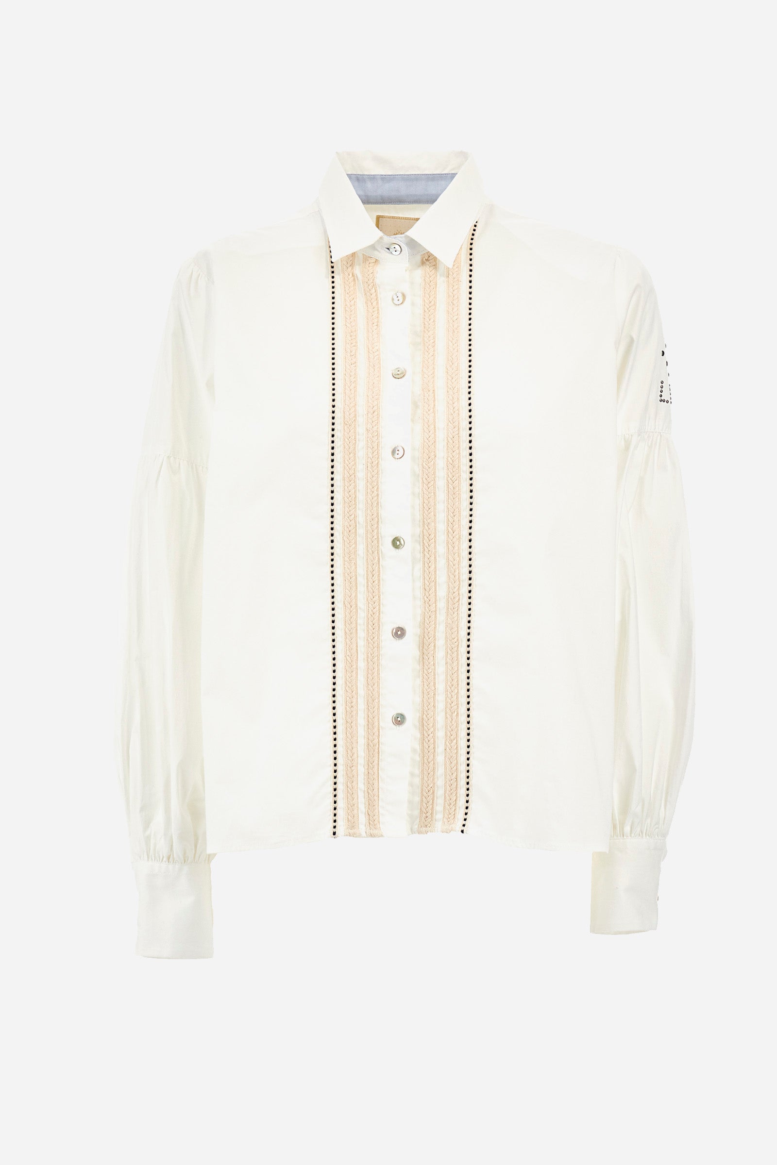 The Argentina women's shirt is made of solid-coloured stretch cotton, with an elegant regular fit. The design features a refined classic collar and button fastening with cable and openwork trims, giving the shirt a distinctive edge. The long sleeves, adorned at the top with a balloon effect, give the shirt a delicate and romantic look. Finally, the LM logo applied the sleeve completes the garment with a sophisticated and contemporary aesthetic. The model is 174 cm tall and wears a size 2. - Optic White