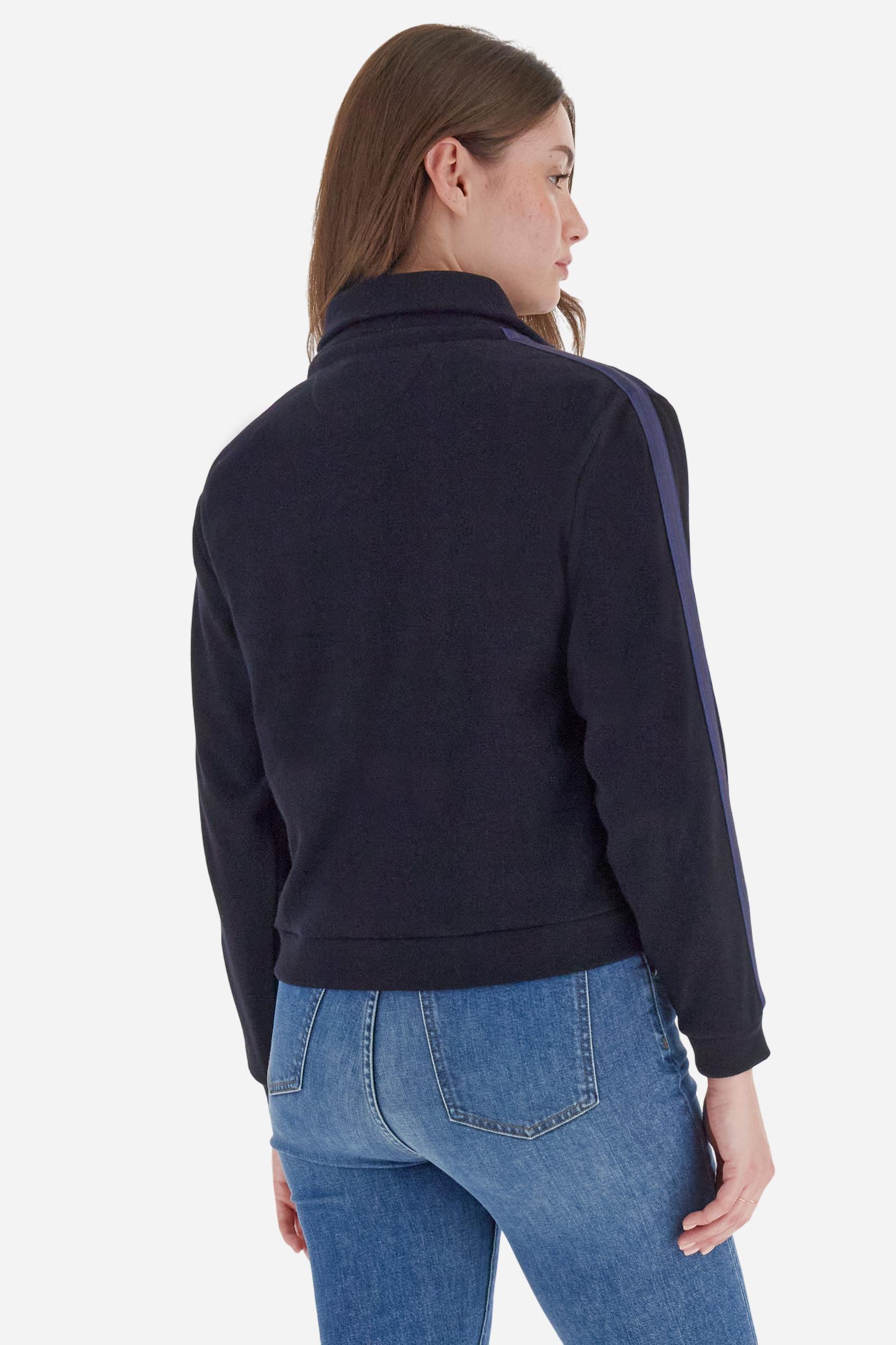 Women’s full-zip sweatshirt with long sleeves in soft interlock viscose blend, offering a luxurious feel on the skin. Straight cut with fluid line and sport-luxury details. Striped bands on the sleeves and heraldic embroidery on the chest add a contemporary touch. The model wears size 2. - Navy