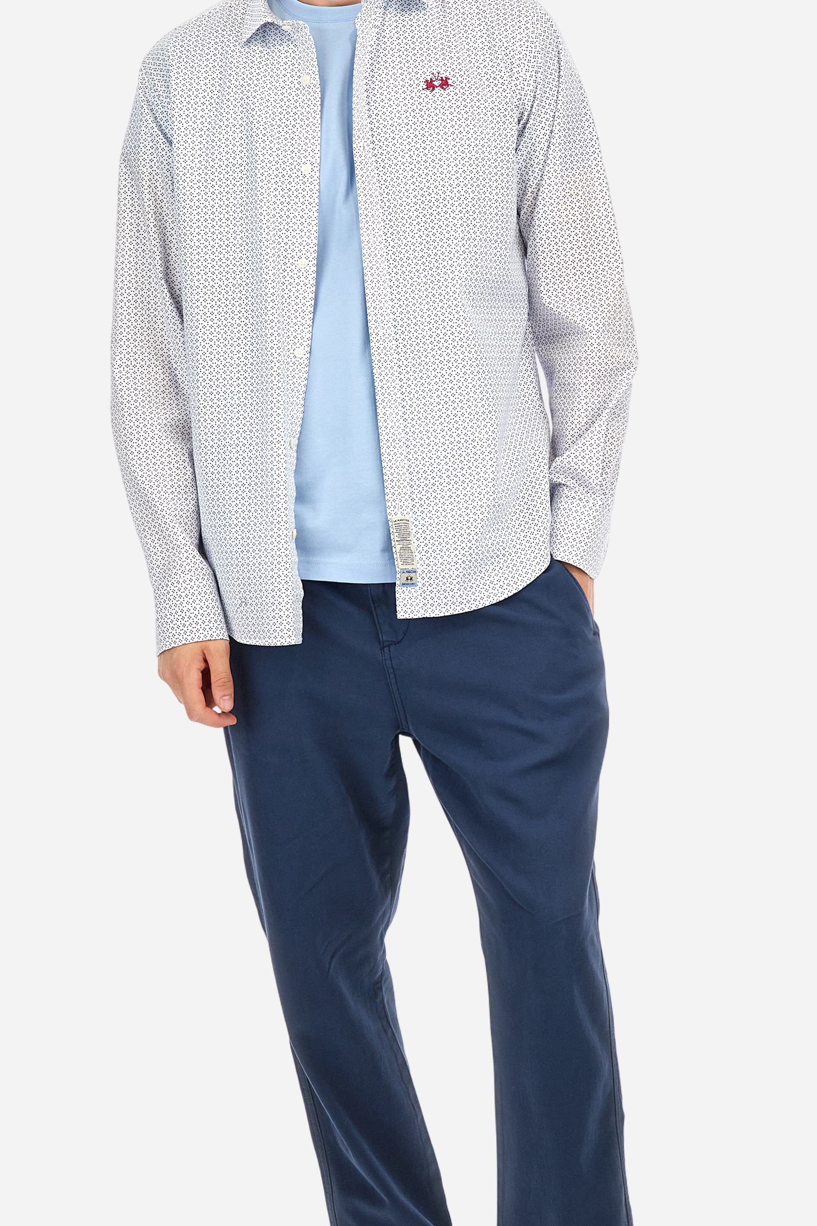 Men's long-sleeved shirt made from cotton poplin printed with a monochrome graphic design. Spread collar. The brand's signature woven labels are sewn onto the opening at the hem. The logo is embroidered in contrasting thread on the left side of the chest. Regular fit. The model is wearing a size L. - Opticwhite/Limonges