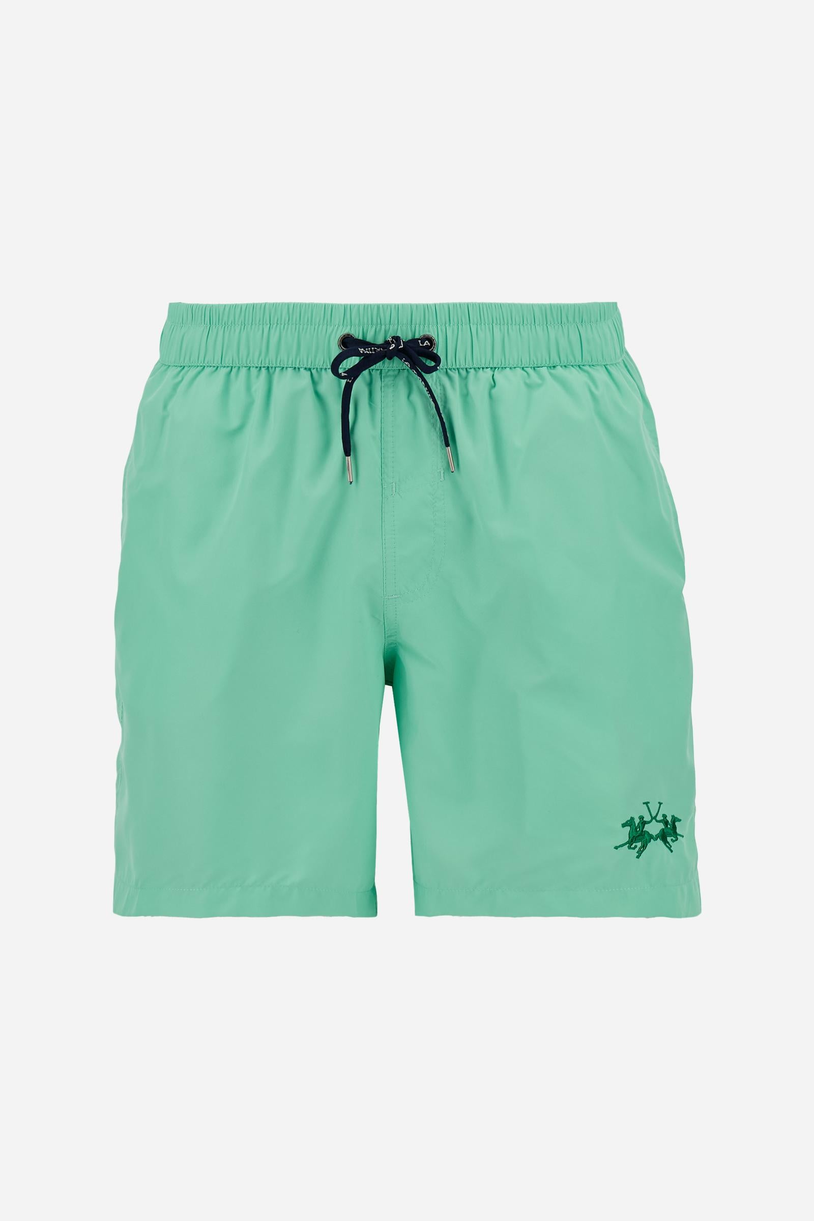 Men’s solid nylon mid-length swim shorts. Regular fit with elasticated waistband, adjustable drawstring, back pocket and embroidered logo. - Opal