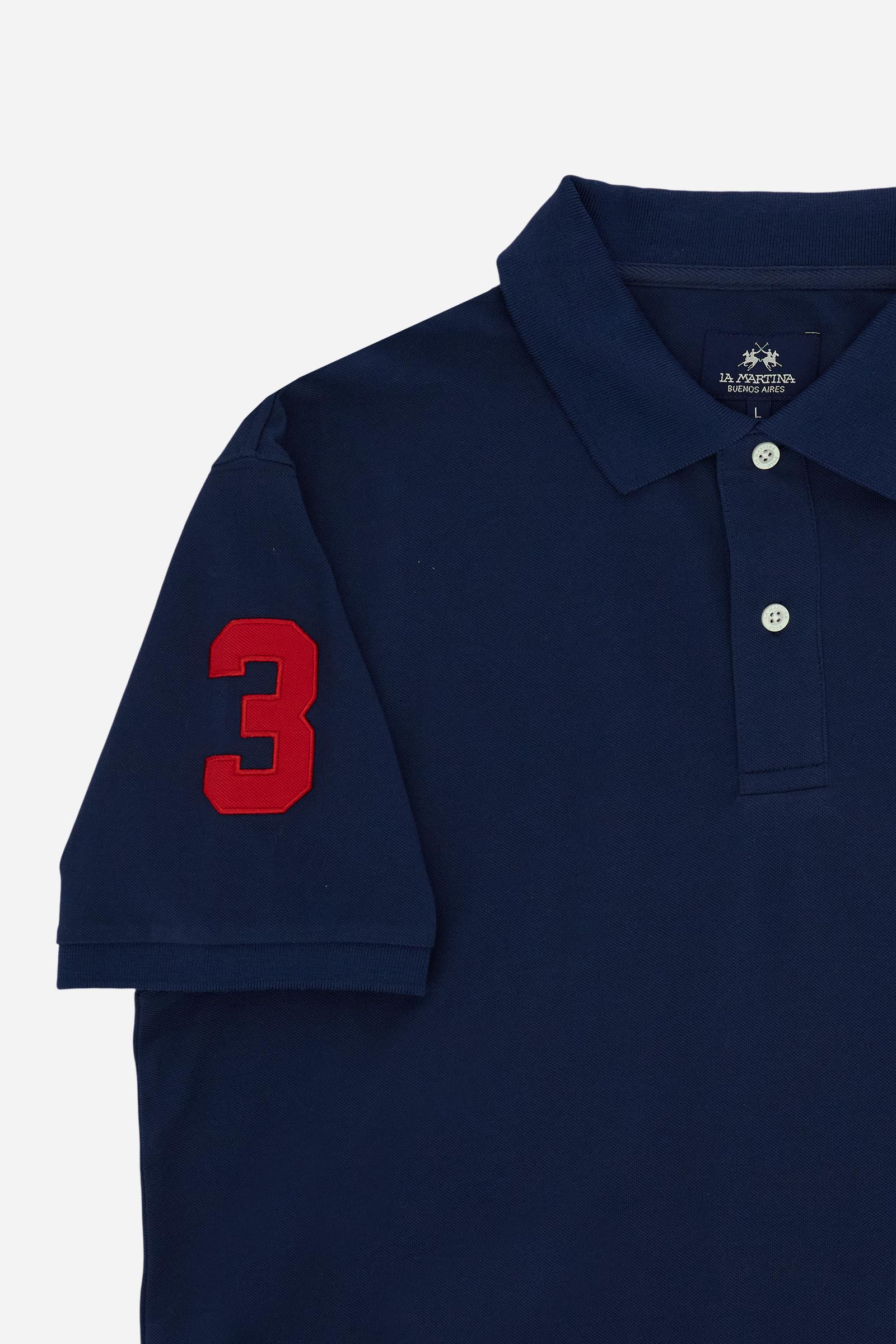 Men’s short-sleeve stretch piqué polo. Two-button placket and ribbed details, with a regular fit. Iconic style characterised by applied logo and patches. - Navy