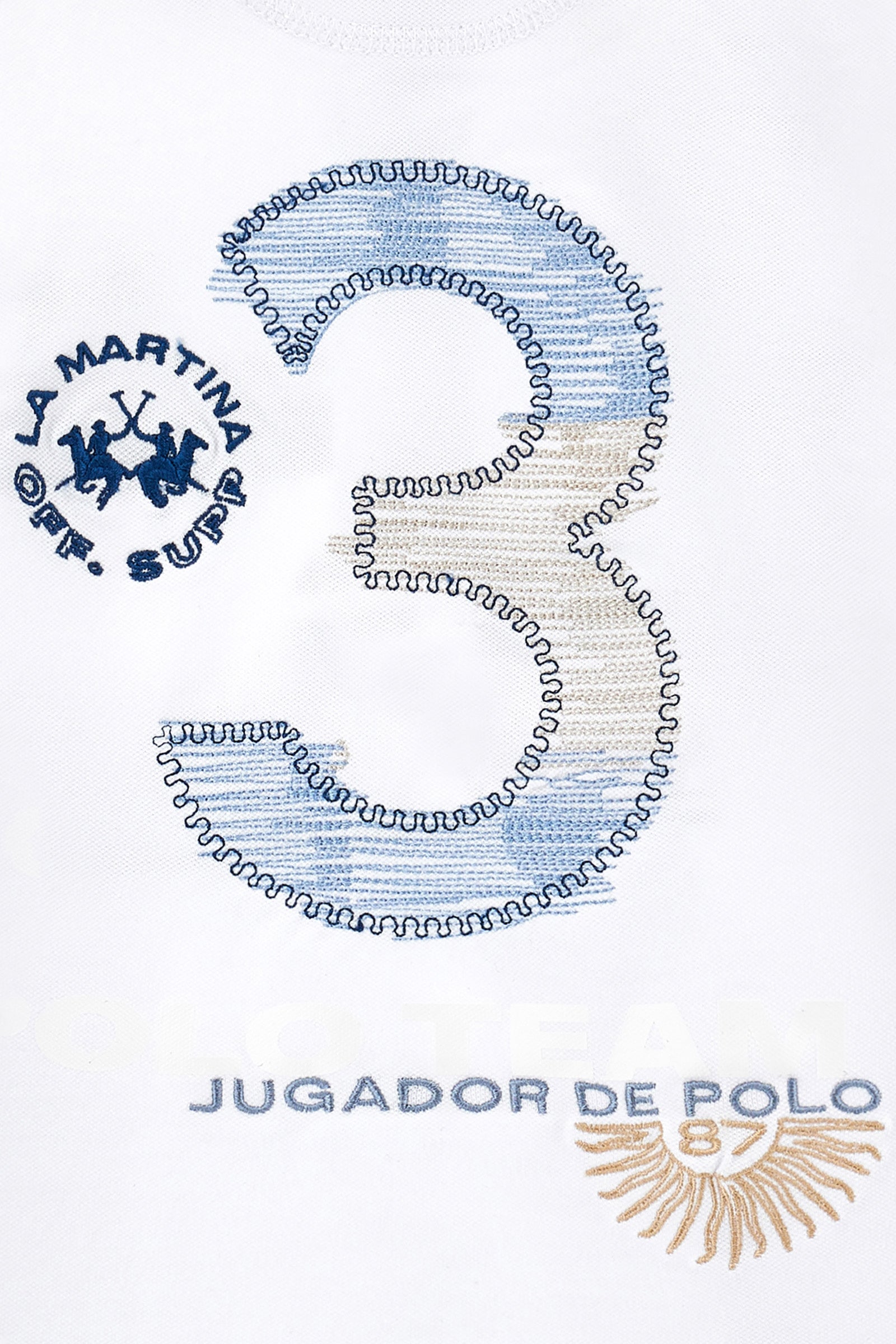 Boys' single-colour polo shirt made of pique cotton. Two-button fastening. Profiled collar with contrasting colour thread. There are various embroideries and rubberised prints on the front of the garment. The logo is on the chest, left side. - Optic White