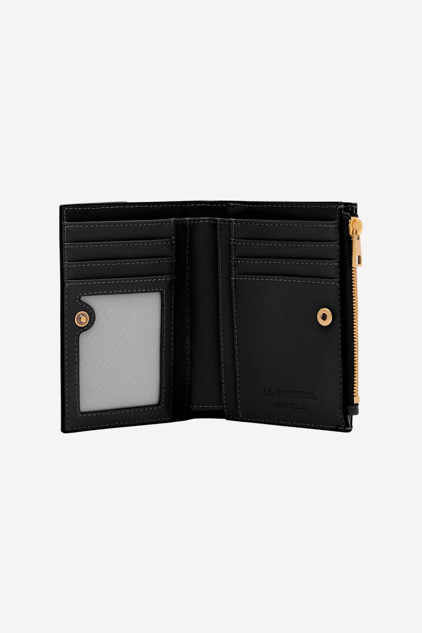 Folding wallet with zip in calfskin leather. Essential and elegant, with front flap and coin pocket. - Black