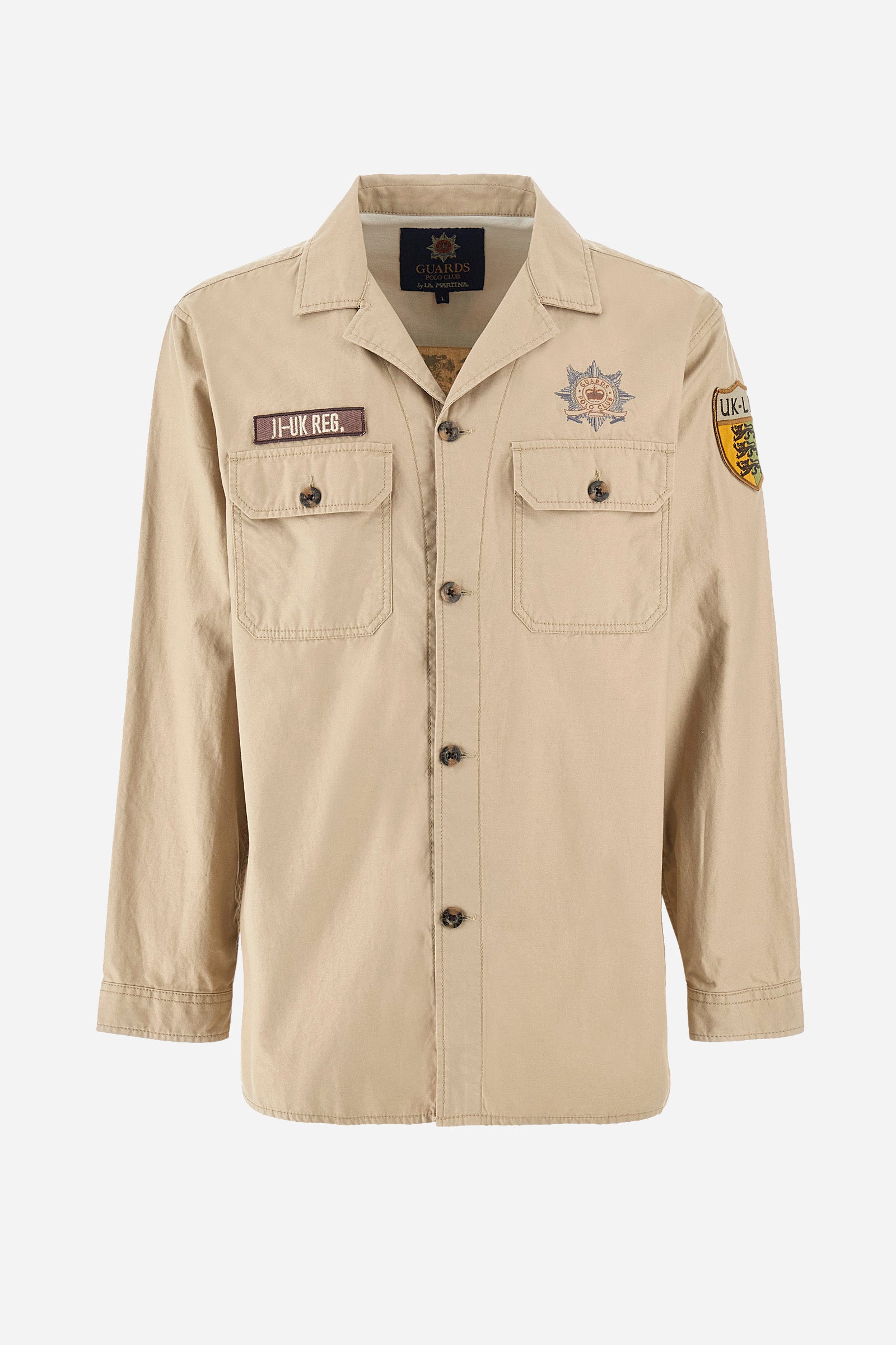 Men’s solid color shirt with long sleeves, Saharan style. Made of 100% cotton. Bowling collar. Cuffs with buttons. Patches applied on the sleeves and front identify the Guards capsule. Two pockets with button on the front. The fit is regular. The model wears a size L. - Tidal Foam