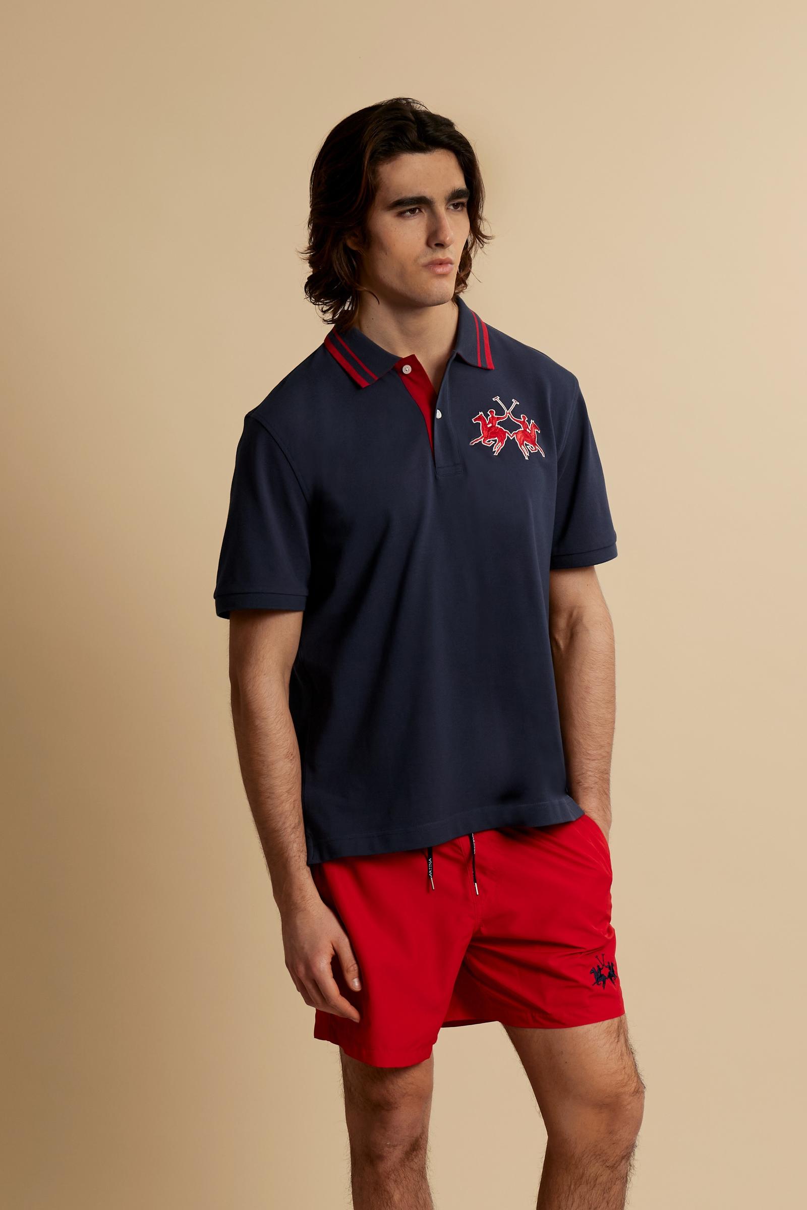 Men’s short-sleeve cotton piqué polo shirt with a new contemporary fit. Embroidered maxi logo and bold colour contrasts define the style. - Navy