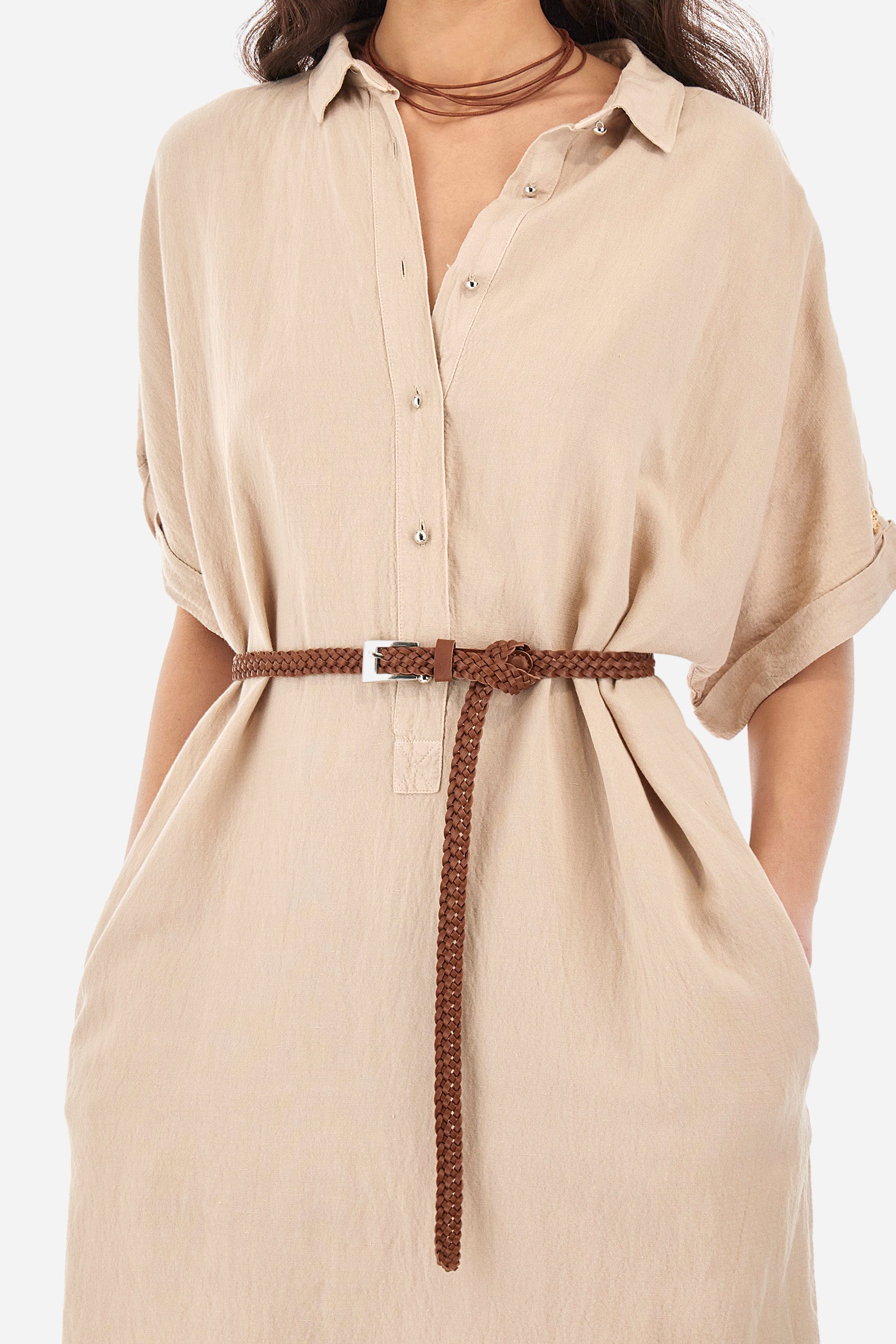 Single-colour short-sleeved dress, in a linen blend. Soft, straight cut silhouette, above-the-knee length. Waistline marked by the belt supplied with the garment. French collar. With button fastening. Featuring two front welt pockets. The number 2 and the lettering "La Martina" are embroidered on the back. The logo is present on a metal plate sewn on one sleeve. The fit is regular. The model wears a size 2. - Tidal Foam