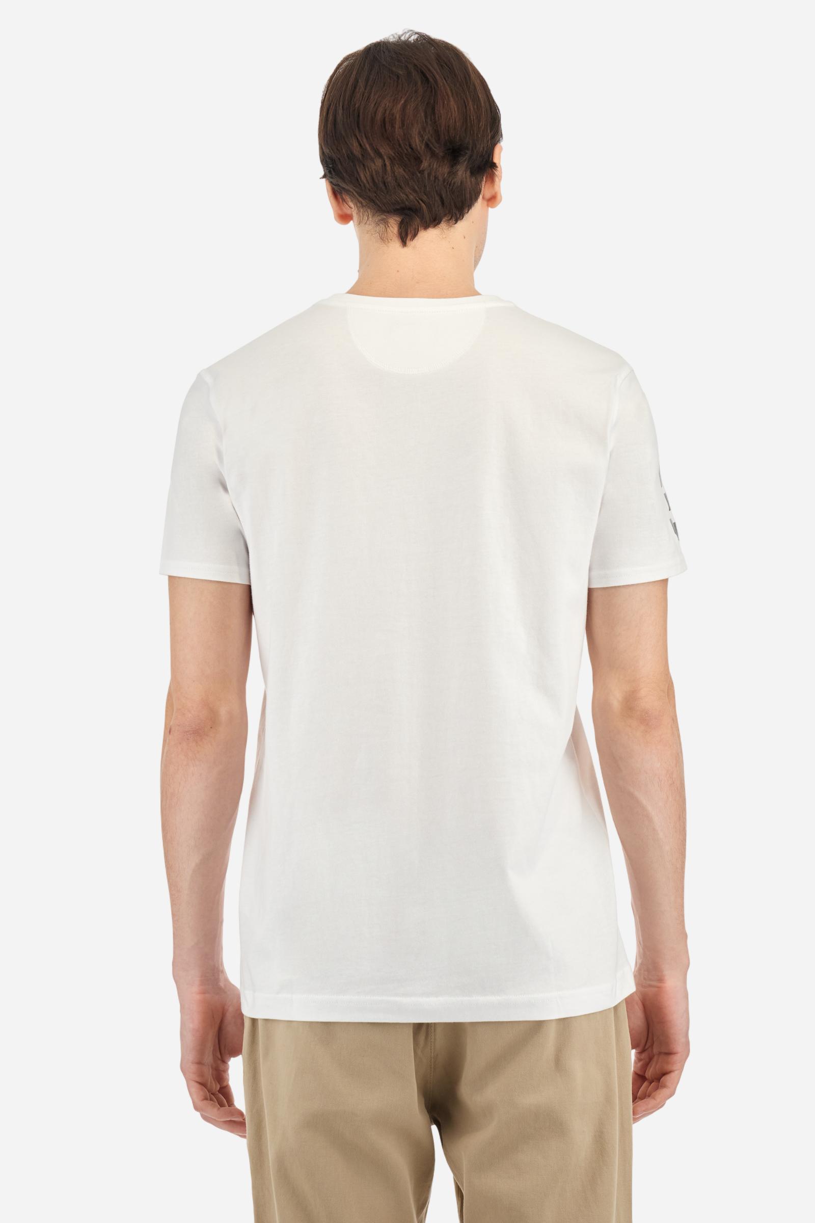 Men's single-colour crew-neck T-shirt with short sleeves, made of 100% cotton. The front features a printed logo and the lettering La Martina Polo. The number 3 is printed on one of the sleeves. Regular fit. The model is wearing a size L. - Optic White