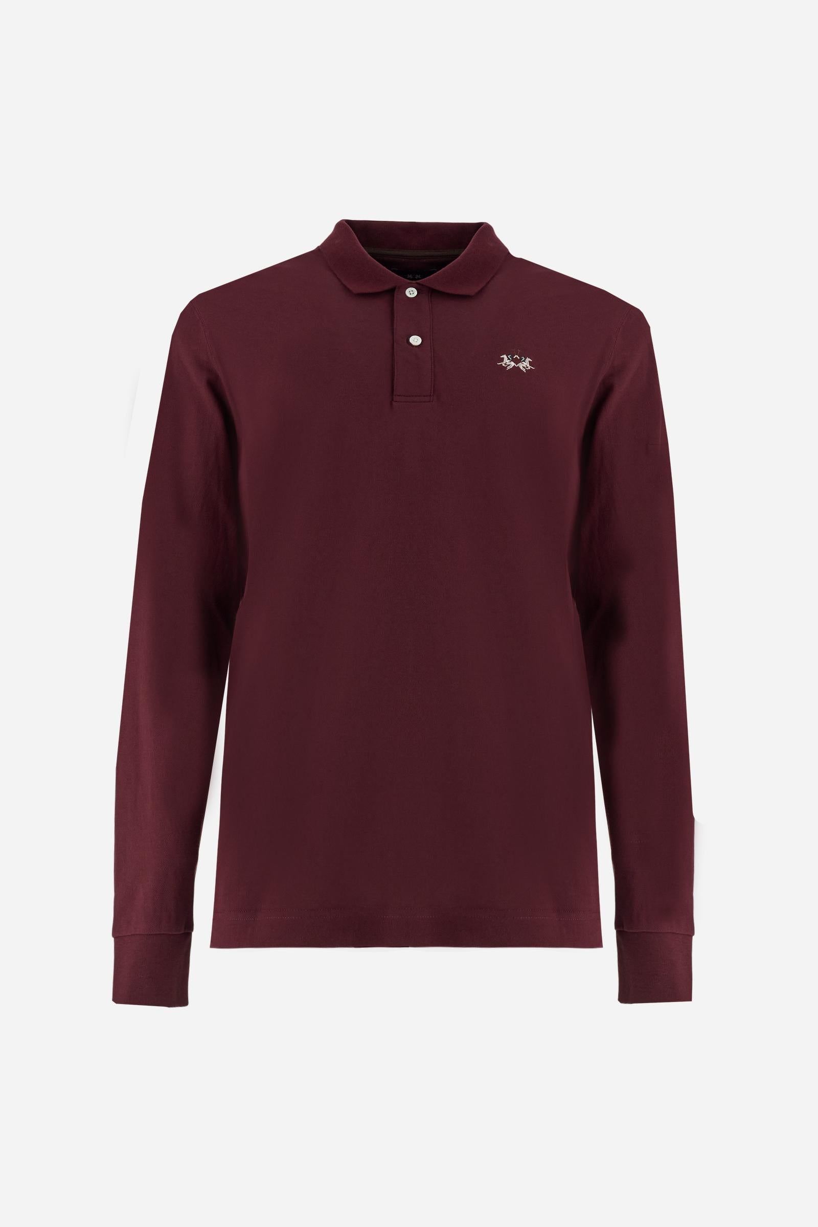 Men’s long-sleeve polo in high-quality stretch cotton piqué for comfort and flexibility. Tone-on-tone ribbed collar with contrast gabardine undercollar embroidered with the brand’s iconic lettering, revealed when the collar is lifted. Contrast embroidered logo on the chest. Slim fit, offering a modern silhouette that enhances the body while ensuring freedom of movement. Model wears size L. - Port Royale