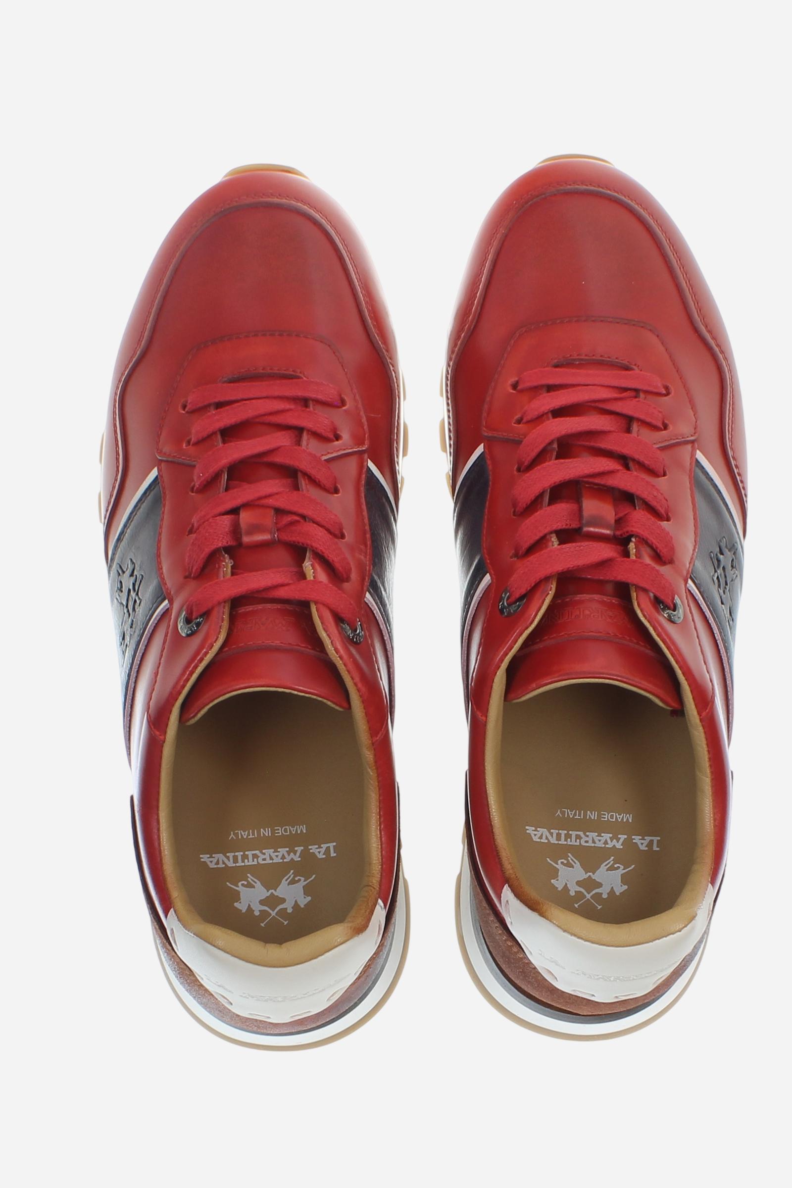 Handcrafted sneakers in calfskin and vegetable-tanned leather, hand-aged. Iconic hot-branded details and a technical sole with leather heel for superior stability. - Red