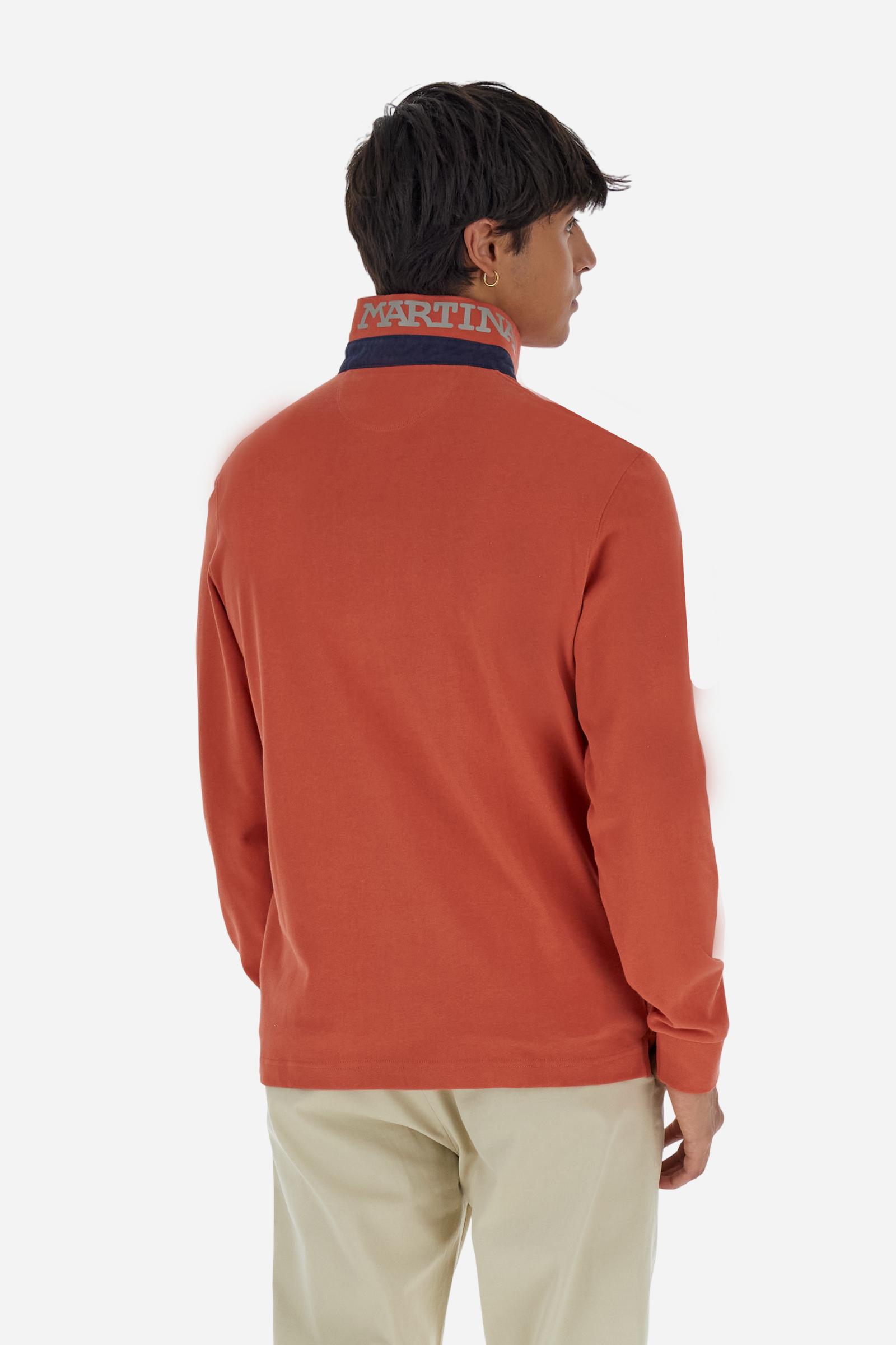 Men’s long-sleeve polo in premium soft-touch cotton jersey for a luxurious feel on the skin. Contrast gabardine details on the collar. Upper collar in tone-on-tone ribbing with printed La Martina lettering undercollar. Three customized buttons, enhanced by a multicolor striped tape on the placket. Contrast embroidered team logo on the chest. Regular fit. Model wears size L. - Burnt Ochre