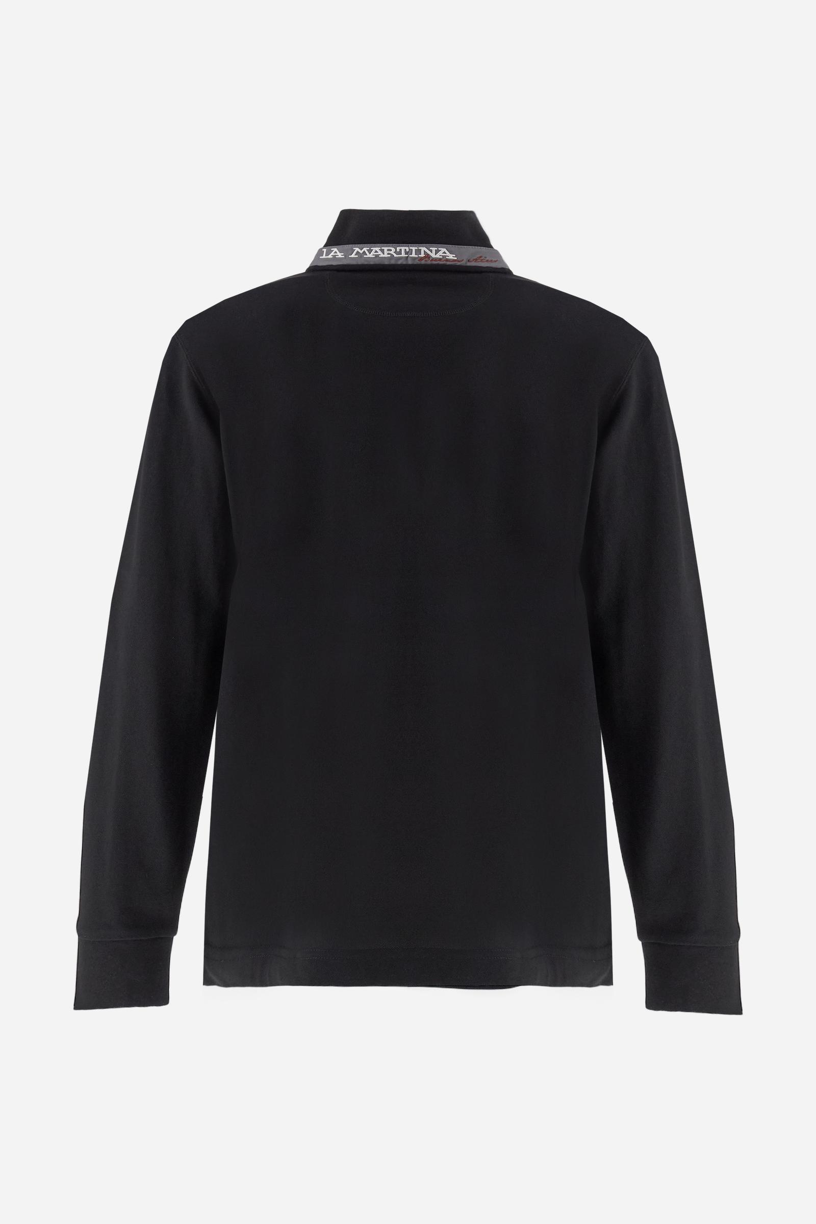 Men’s long-sleeve polo in high-quality stretch cotton piqué for comfort and flexibility. Tone-on-tone ribbed collar with contrast gabardine undercollar embroidered with the brand’s iconic lettering, revealed when the collar is lifted. Contrast embroidered logo on the chest. Slim fit, offering a modern silhouette that enhances the body while ensuring freedom of movement. Model wears size L. - Black