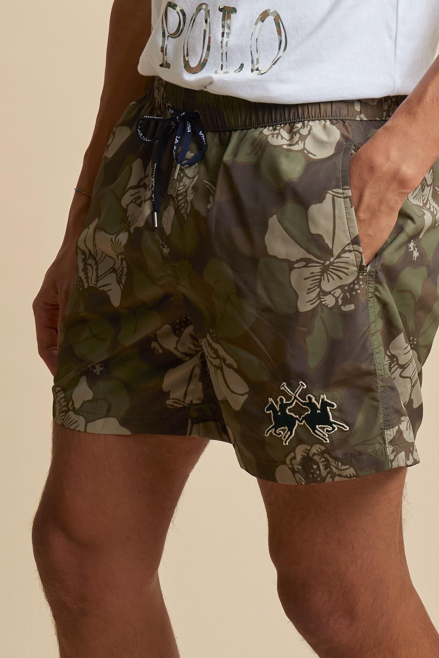 Men’s nylon swim shorts with camouflage print in earthy tones. Regular fit with elasticated waistband, drawstring and embroidered logo. - Wren/Burnt Olive