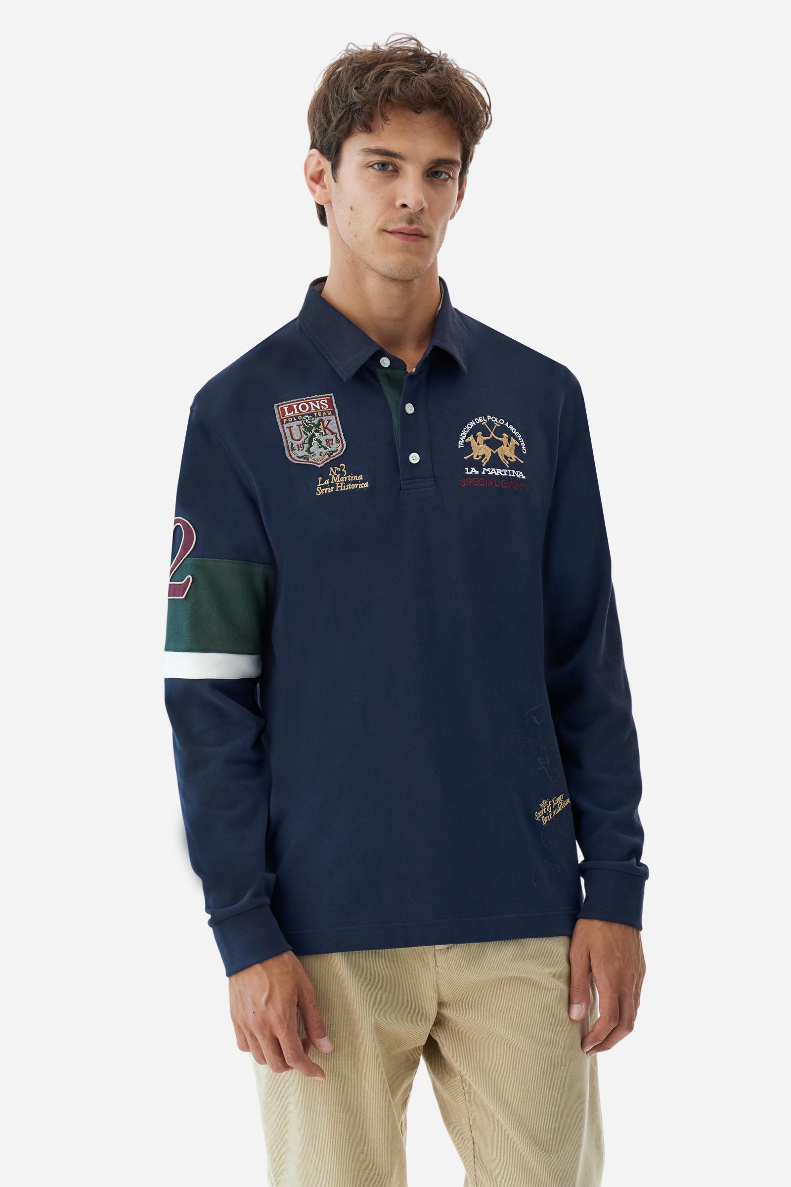 Long-sleeve polo shirt in 100% cotton jersey, soft and warm to the touch. Gabardine collar in tone with a contrast placket for a modern look. The English flag is printed under the raised right collar tip. Contrasting fabric bands and a patch with number 2 decorate the right sleeve, evoking polo player uniforms. Multicolor graphics dedicated to the English team and past special events enrich the design, with a large team logo embroidered in two-tone on the chest. Regular fit. Model wears size L. - Navy