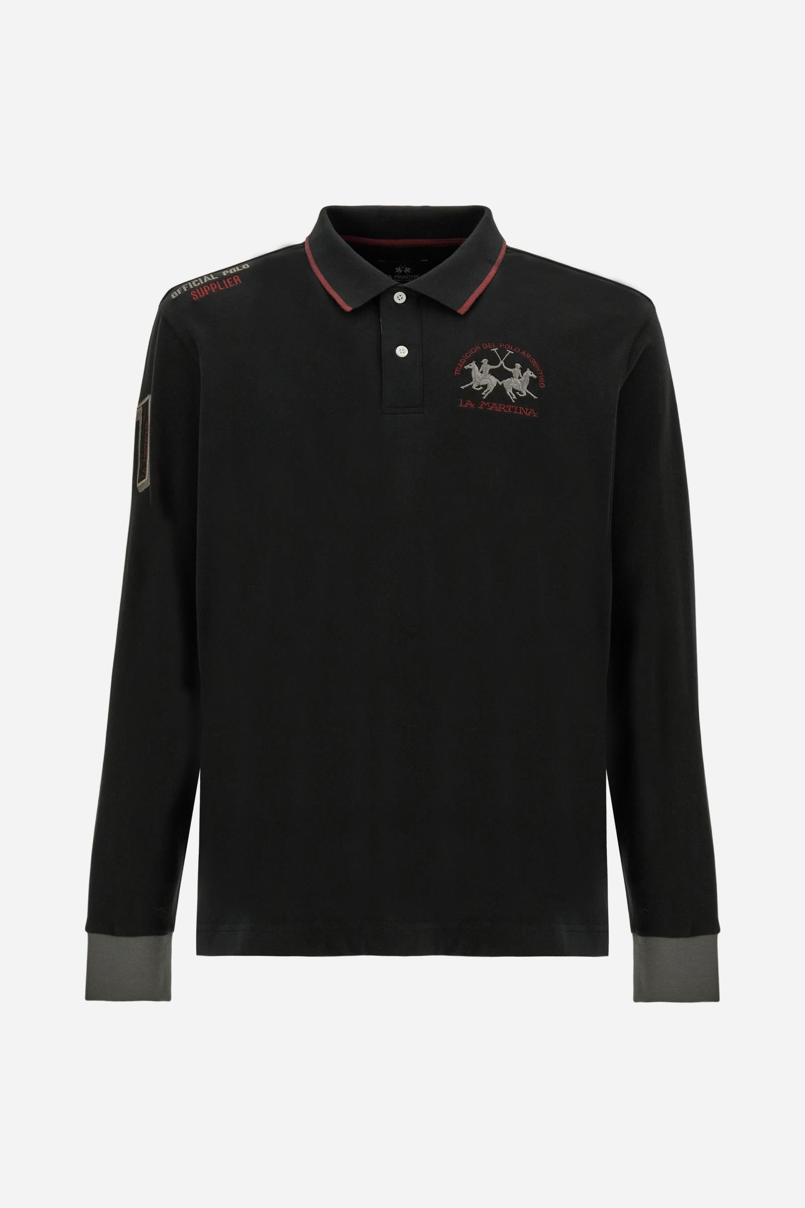 Men’s long-sleeve polo shirt in solid-colour cotton jersey with a warm, matte handfeel. Ribbed collar and cuffs with stripes and colour blocks in contrast, two personalised buttons and contrast details inside the collar. Patches and graphics on sleeves and chest celebrate the Official Polo Supplier team. The large multicolour logo is embroidered on the chest. Regular fit. The model wears size L. - Black
