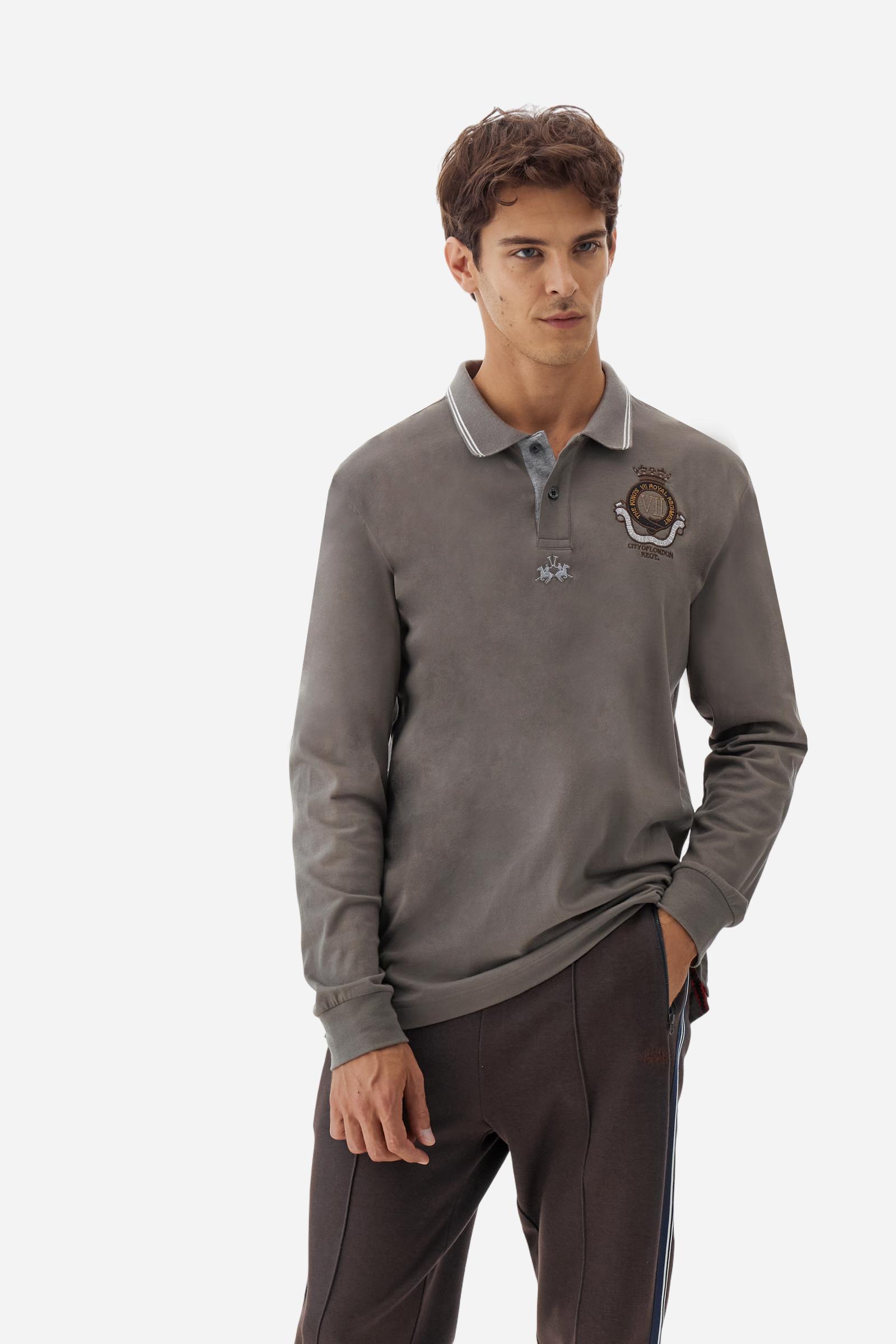 Long-sleeve polo shirt in stretch cotton jersey, soft and breathable. Ribbed collar with contrast striped edge and inner tartan ribbon. A colorful embroidered crest enriches the chest, complemented by a tonal embroidered logo under the placket with two personalized buttons. Regular fit for a versatile, timeless look. Model wears size L. - Falcon
