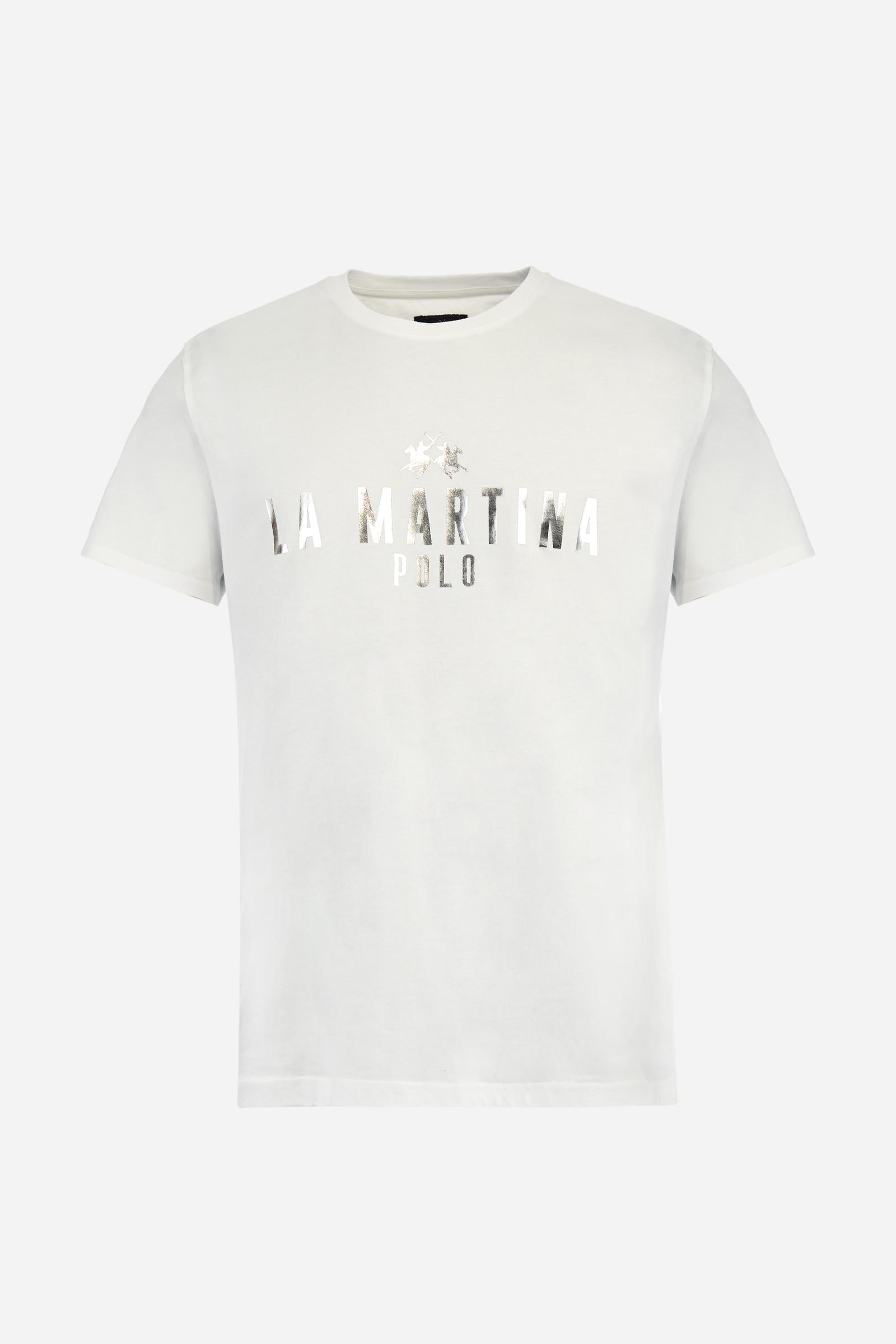 Men's single-colour crew-neck T-shirt with short sleeves, made of 100% cotton. The front features a printed logo and the lettering La Martina Polo. The number 3 is printed on one of the sleeves. Regular fit. The model is wearing a size L. - Optic White