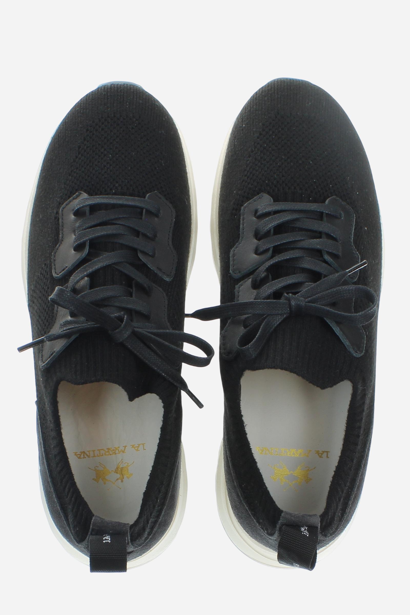 Men’s breathable knit sneakers with suede details and lightweight EVA sole. Minimal design with heel logo. - Black