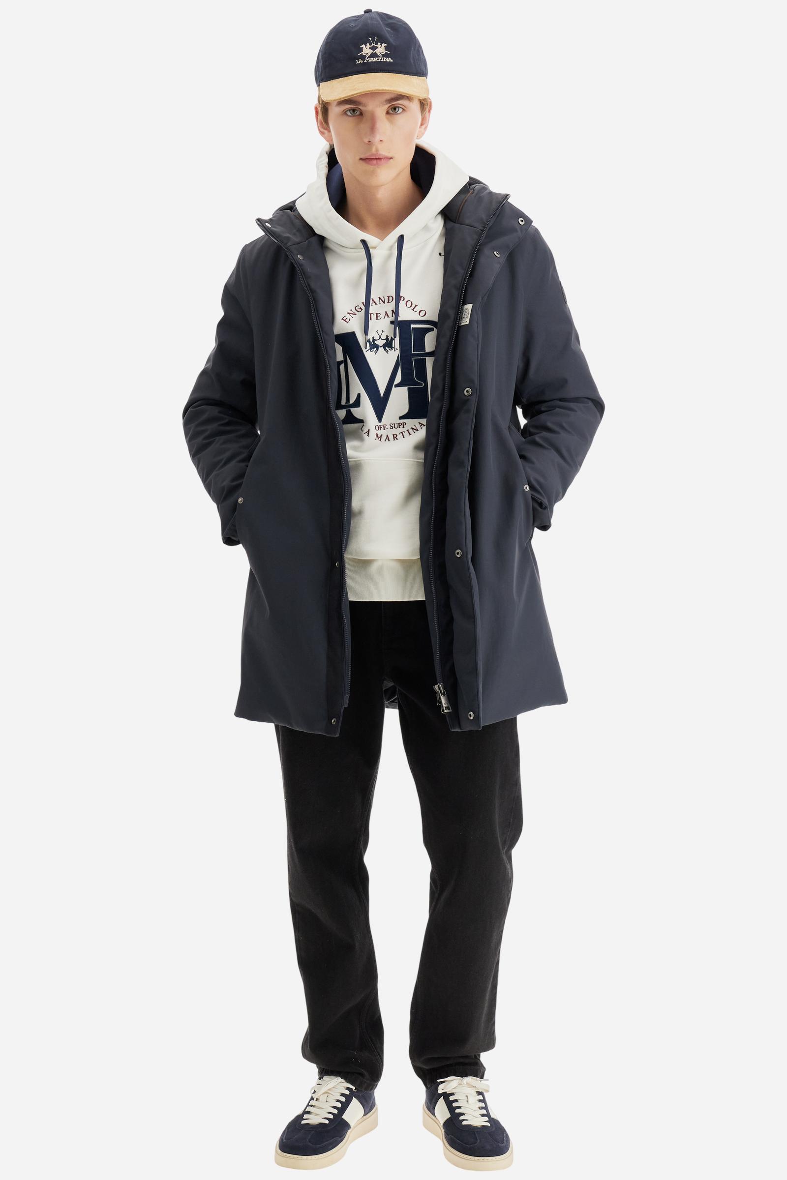 Men's long-sleeved hoodie in solid cotton French terry. Features a large kangaroo pocket, hem and cuffs in tone-on-tone rib. Adjustable hood with contrast lining. Chest and sleeves decorated with modern LM monogram graphics inspired by British polo. Contrasting embroidered logo on the chest. Regular fit for a relaxed and comfortable silhouette. Model wears size L. - Off White