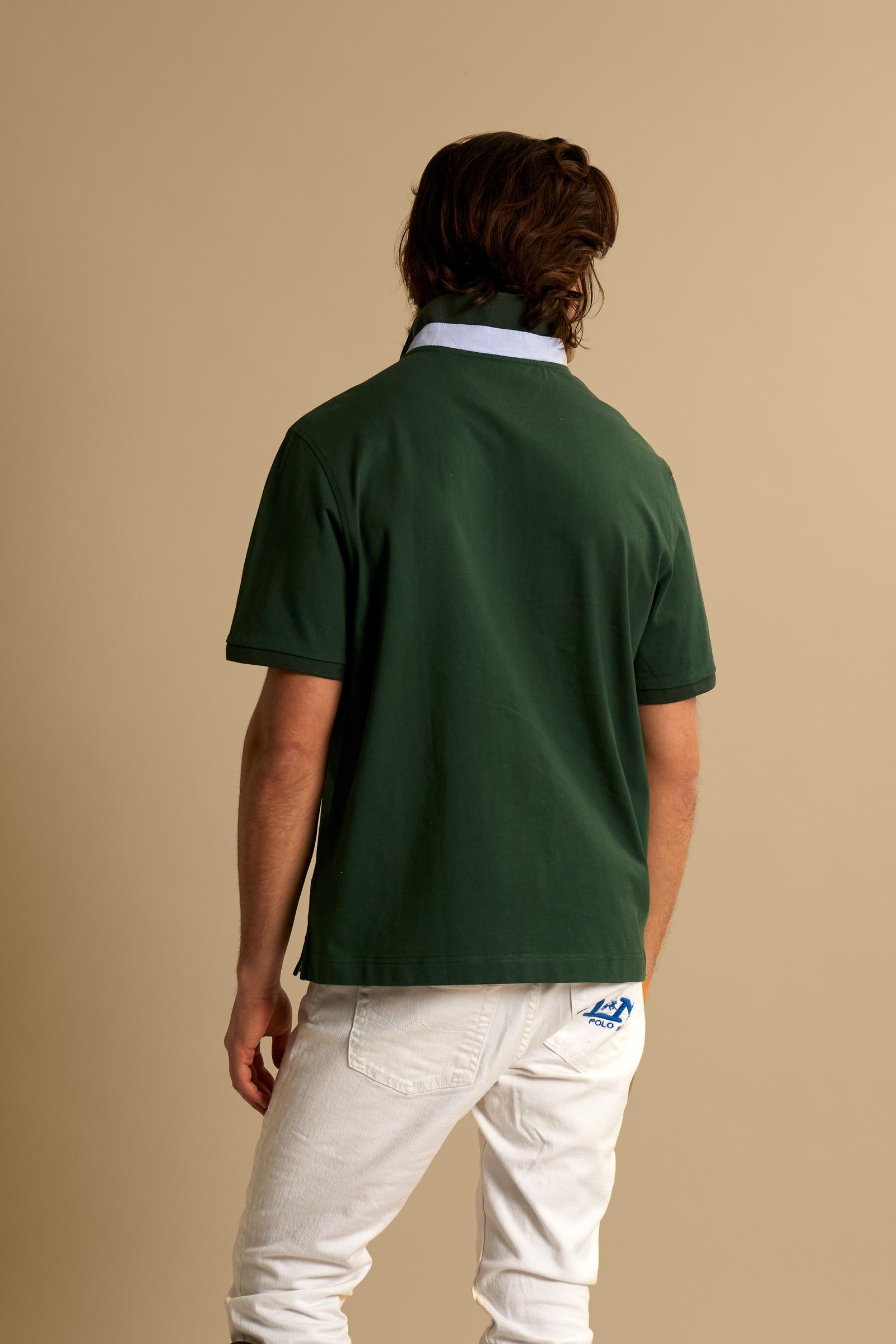 Short-sleeve polo in heavy cotton jersey with contrast details under the collar and placket. “La Martina Polo Club” embroidery on the chest with “Academy Polo Club” crest and additional embroidered detail. Soft contemporary fit. - Pineneedle