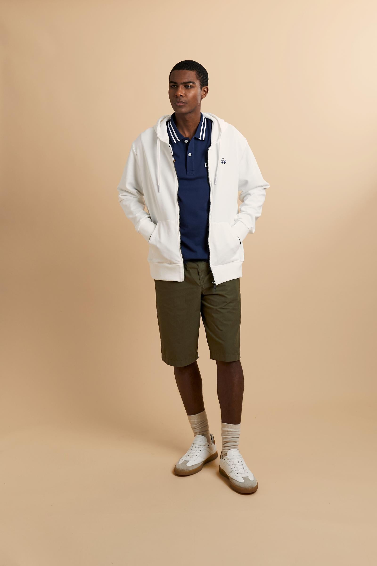 Hooded sweatshirt in lightweight unbrushed cotton with front zip and adjustable drawstring hood with metal tips. Kangaroo pockets and ribbed trims. Relaxed regular fit with contrast embroidered logo on the chest. - Off White