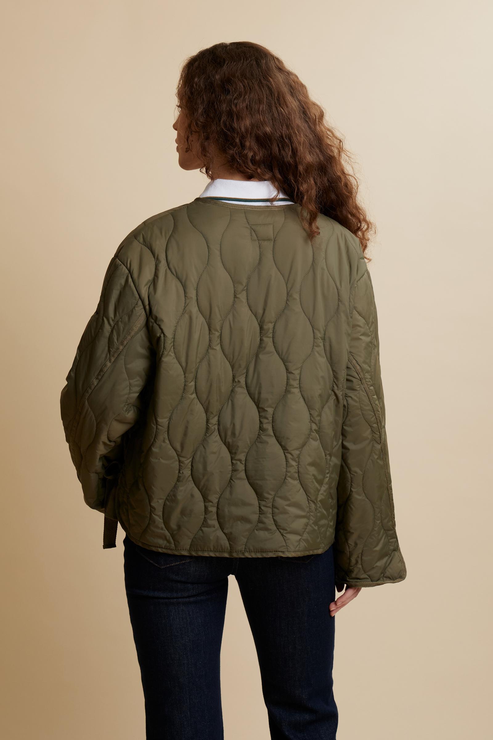 Women’s long-sleeve quilted nylon jacket with wave pattern. Wide, boxy cut with adjustable side bows and tone-on-tone embroidered logo on the sleeve. - Burnt Olive