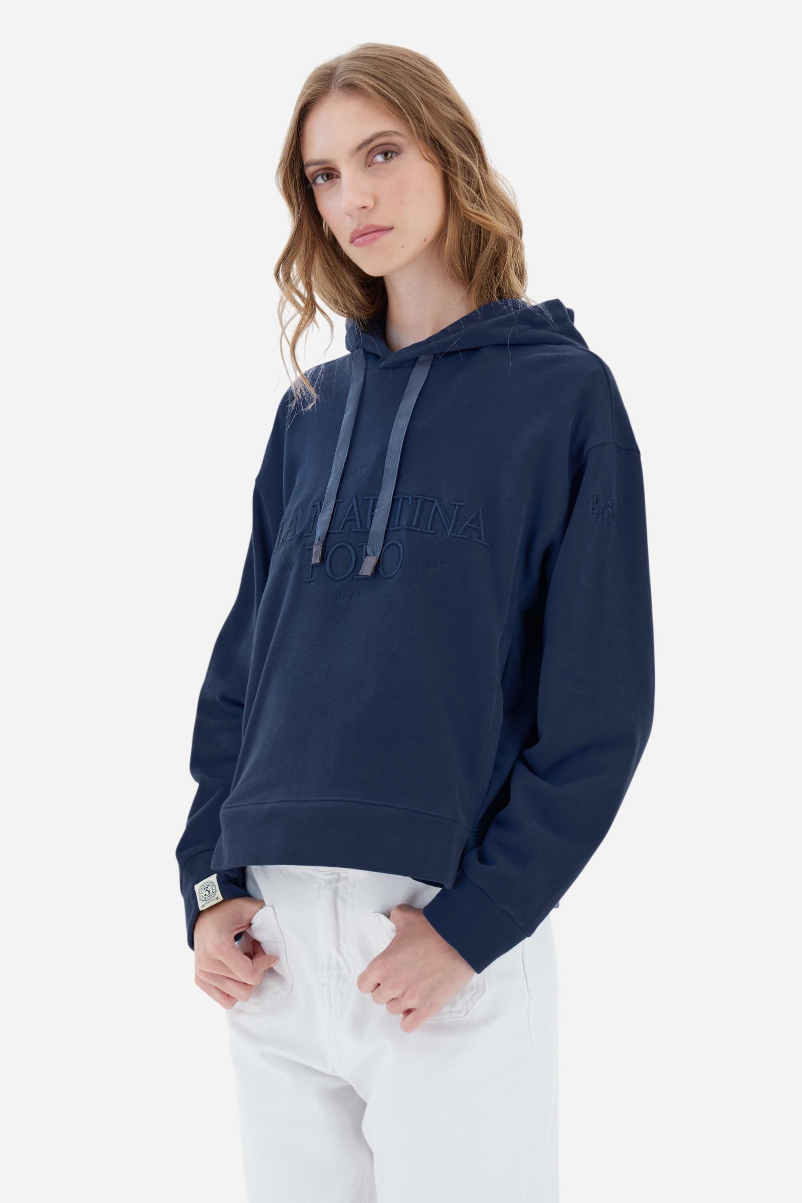 Women’s hoodie with long sleeves in 100% cotton french terry, solid colour with a velvety and warm touch. The hood is lined in tone-on-tone jersey and finished with a velvet drawstring. The chest graphic recalls the refined aesthetics of the Royal Polo theme, while the small brand logo is tone-on-tone embroidered on the sleeve. The model wears size L. - Navy