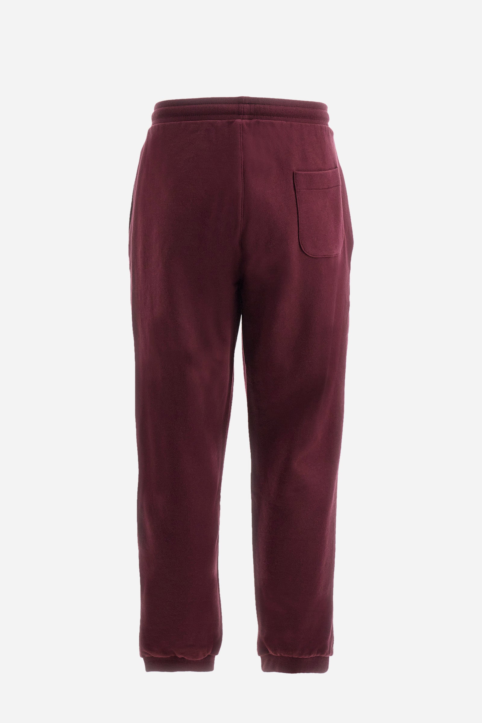 Men's plain jogging bottoms, made from 100% cotton. Drawstring waist and double front pocket. There is an additional pocket on the back. The logo is embroidered on the front. Regular fit. The model is wearing a size L. - Port Royale
