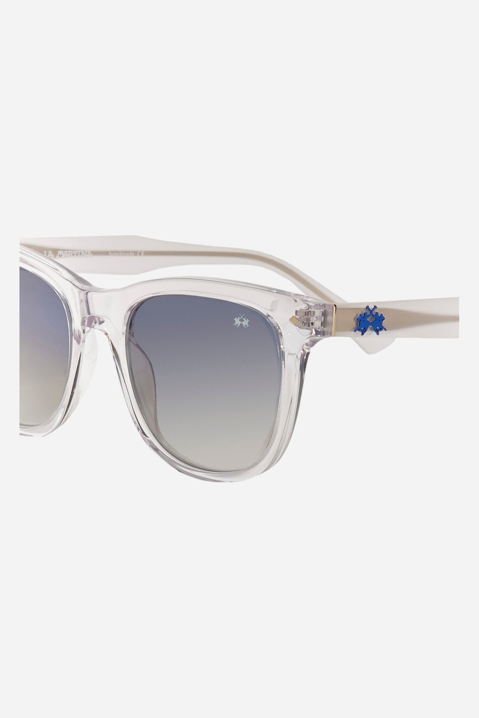 Men squared sunglasses in acetate material. This classic style model features a small La Martina plaque logo on the temple and lenses with internal blue anti-reflection. The dark havana-colored frame makes it easy to wear, while the coloring allows you to wear the glasses with any look and always be fashionable. - CRYSTAL