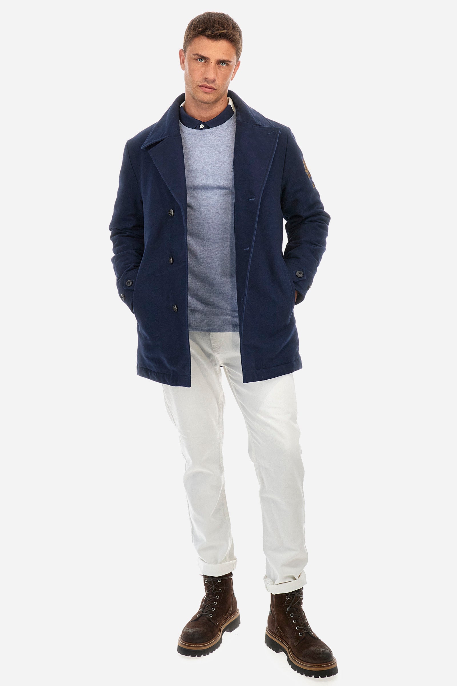 Men's plain crew neck pullover with long sleeves. Made from a blend of cotton and wool. Ribbed hem and neckline. Featuring a small embroidered logo on the front. Regular fit. The model is wearing a size L. - Cashmere Blue Melang