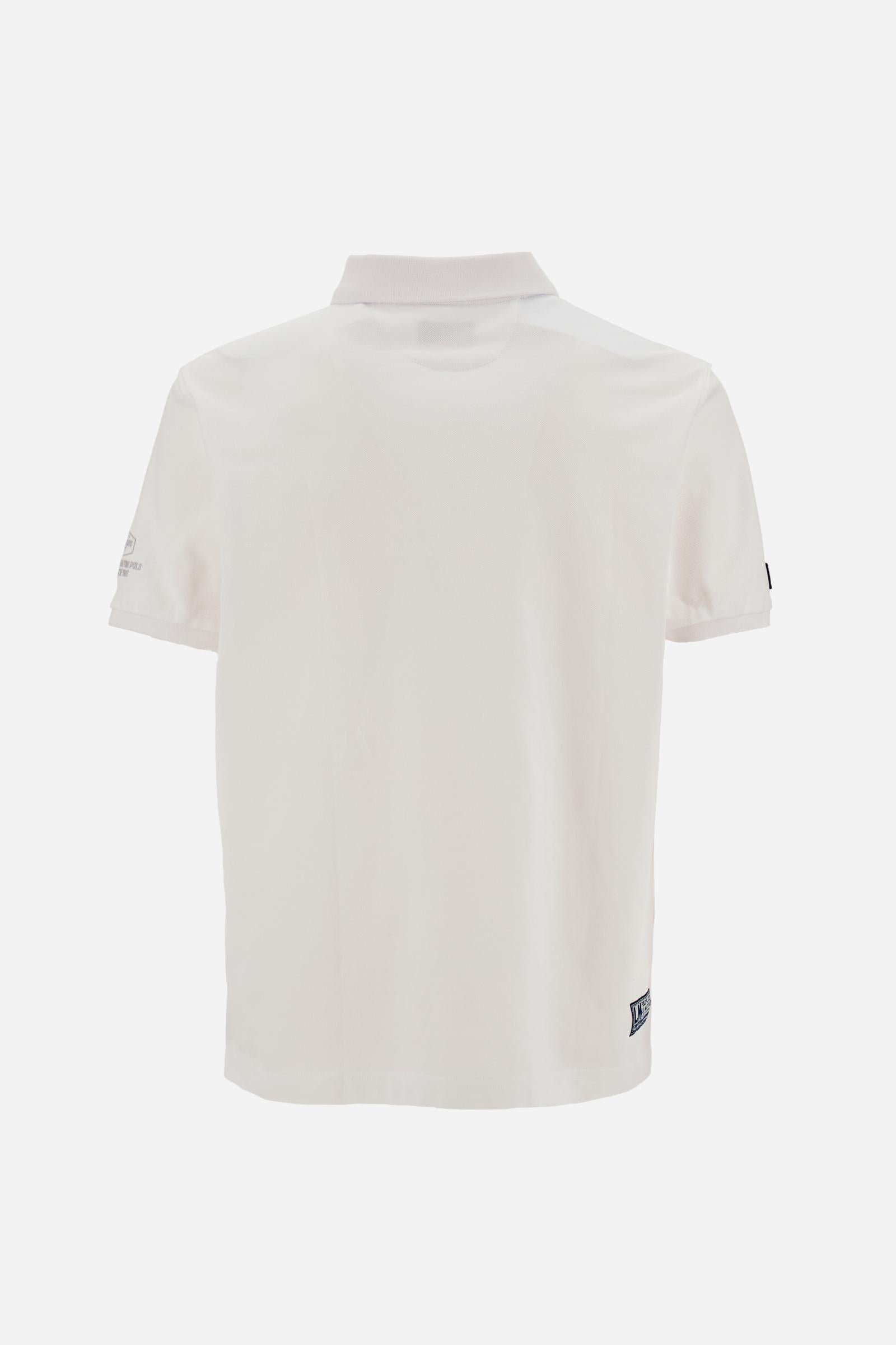 Men’s short-sleeve stretch piqué polo. Two-button placket and ribbed details, with a regular fit. Iconic style characterised by applied logo and patches. - Optic White