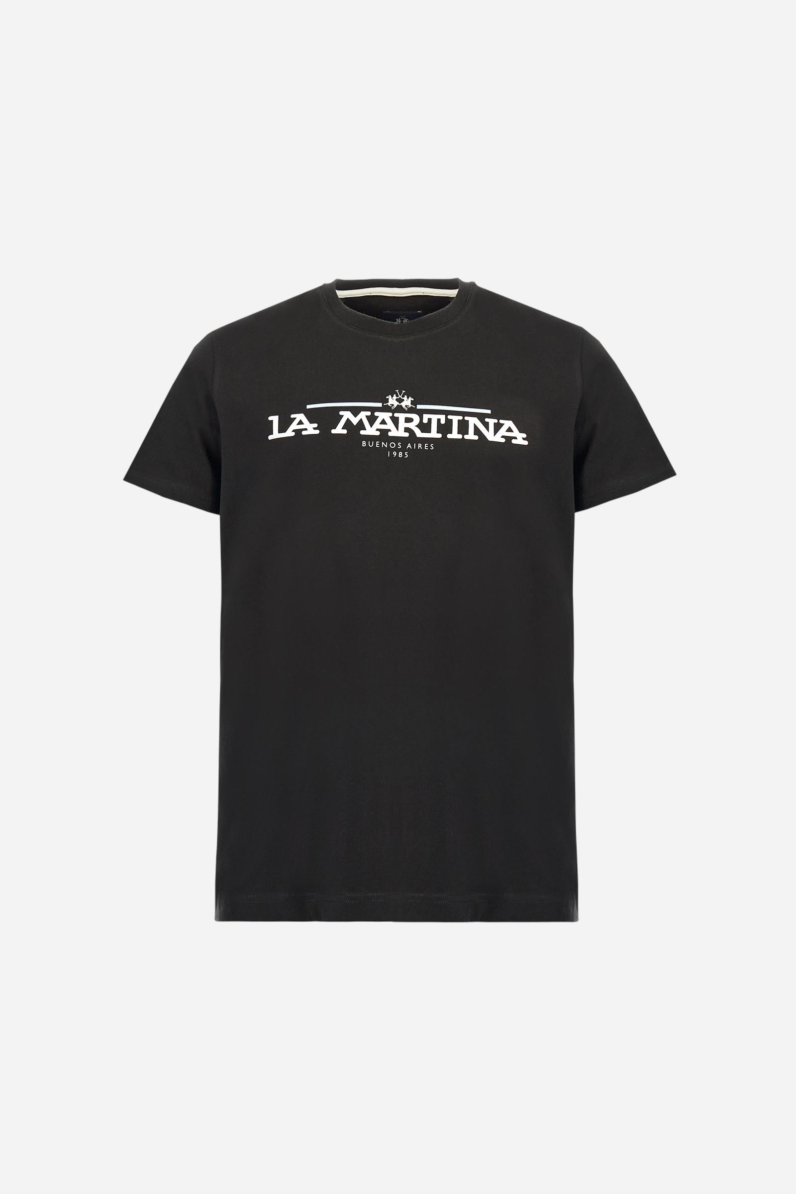 Men's solid color T-shirt, made of cotton jersey. Crew neck. The front features the La Martina text in print. The logo is embroidered on the front, in the center of the chest. The fit is regular. The model is wearing size L. - Black