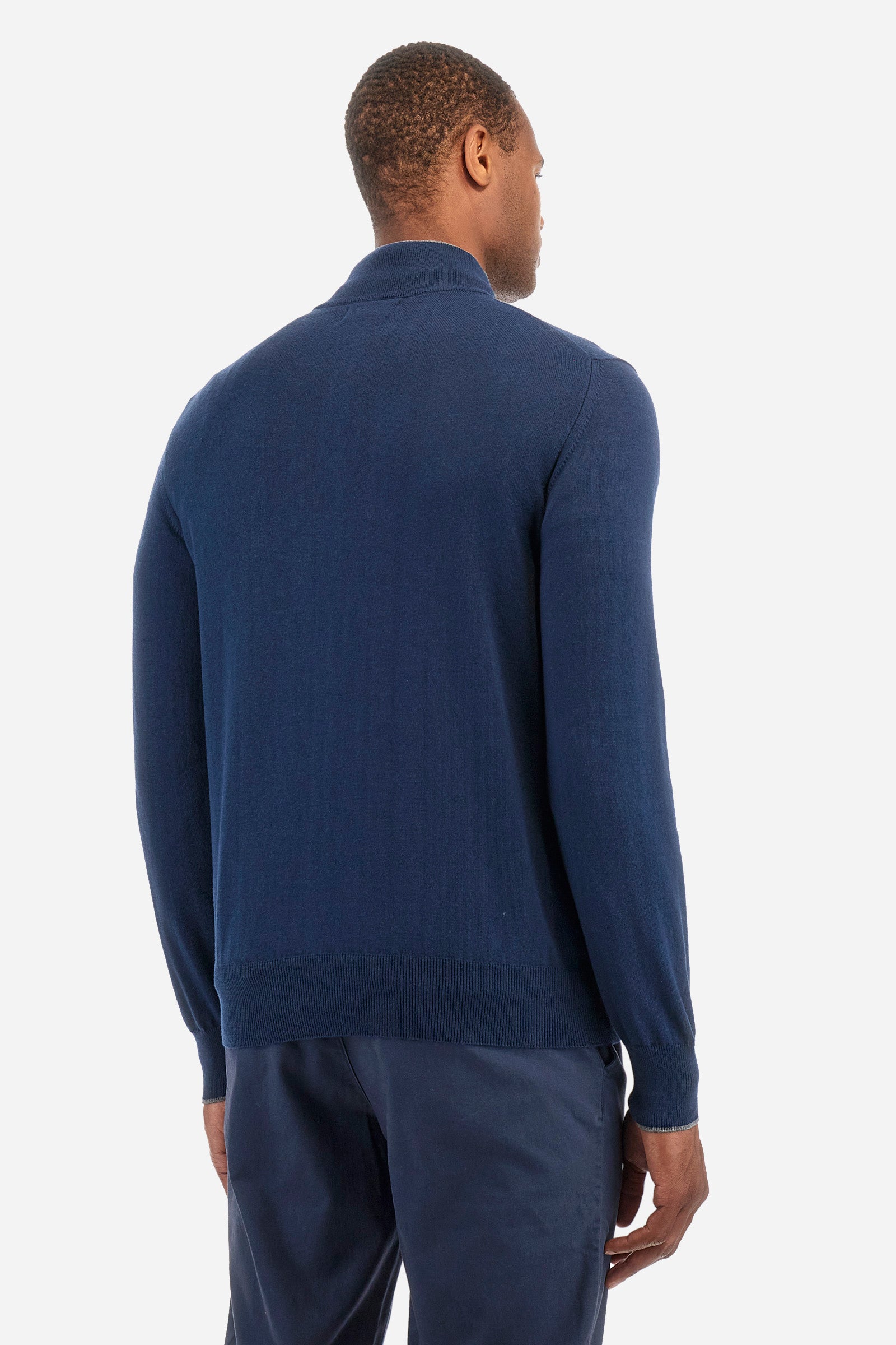 Men's plain mock polo neck pullover with long sleeves. Trimmed collar with a half zip, made from ribbed fabric to match the cuffs and hem. Made from a blend of cotton and wool. Featuring a small embroidered logo on the front. Regular fit. The model is wearing a size L. - Navy